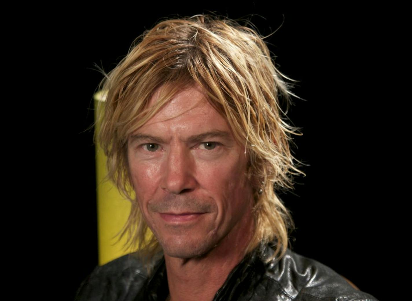 In this image taken Oct. 4, 2011, former Guns N� Roses bassist Duff McKagan poses for a photo in New York. In the years since Duff McKagan left Guns N' Roses and Velvet Revolver behind, he has emerged as something of a renaissance man. He writes about sports for ESPN.com, has his own wealth management company, Merdian Rock, for musicians, and now, is an author with the book �It's So Easy (and Other Lies),� which was recently released by Simon & Schuster.