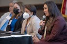 Marisa Miakonda Cummings, (Umonhon/Omaha), President/CEO of the Minnesota Indian Women’s Resource Center, right, addresses Members of the Advisory C