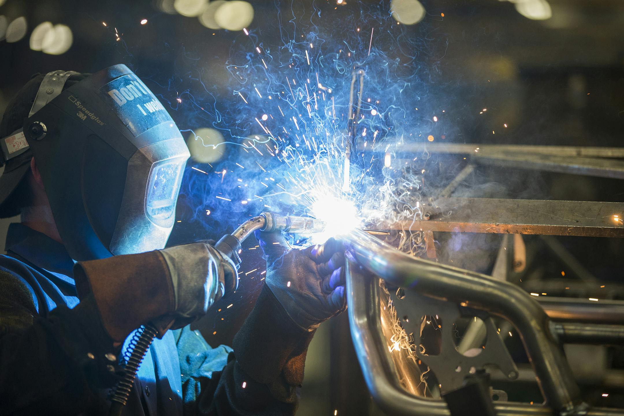 A worker welds the frame for the 2016 Wildcat X side-by-side vehicle in 2015 at the Arctic Cat factory in Thief River Falls. (Leila Navidi)