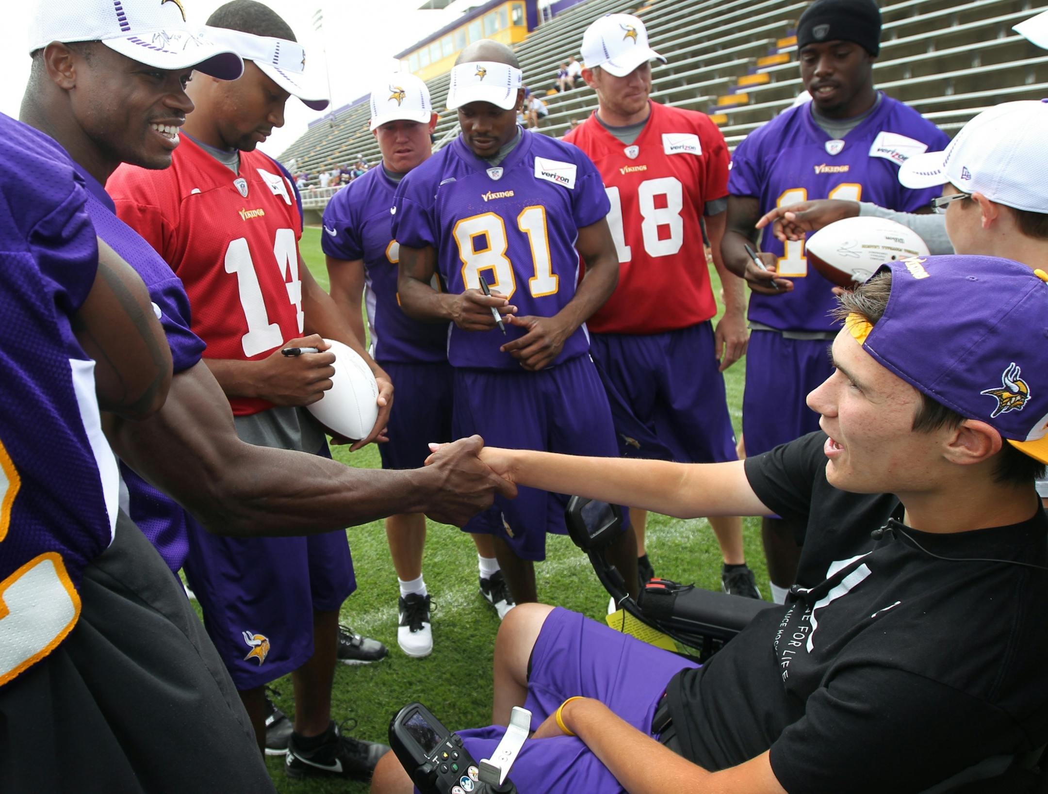 Vikings running Adrian Peterson shook hands with Jack Jablonski after practice at Minnesota State University, Mankato Wednesday August 15, 2012 Mankato ,MN .