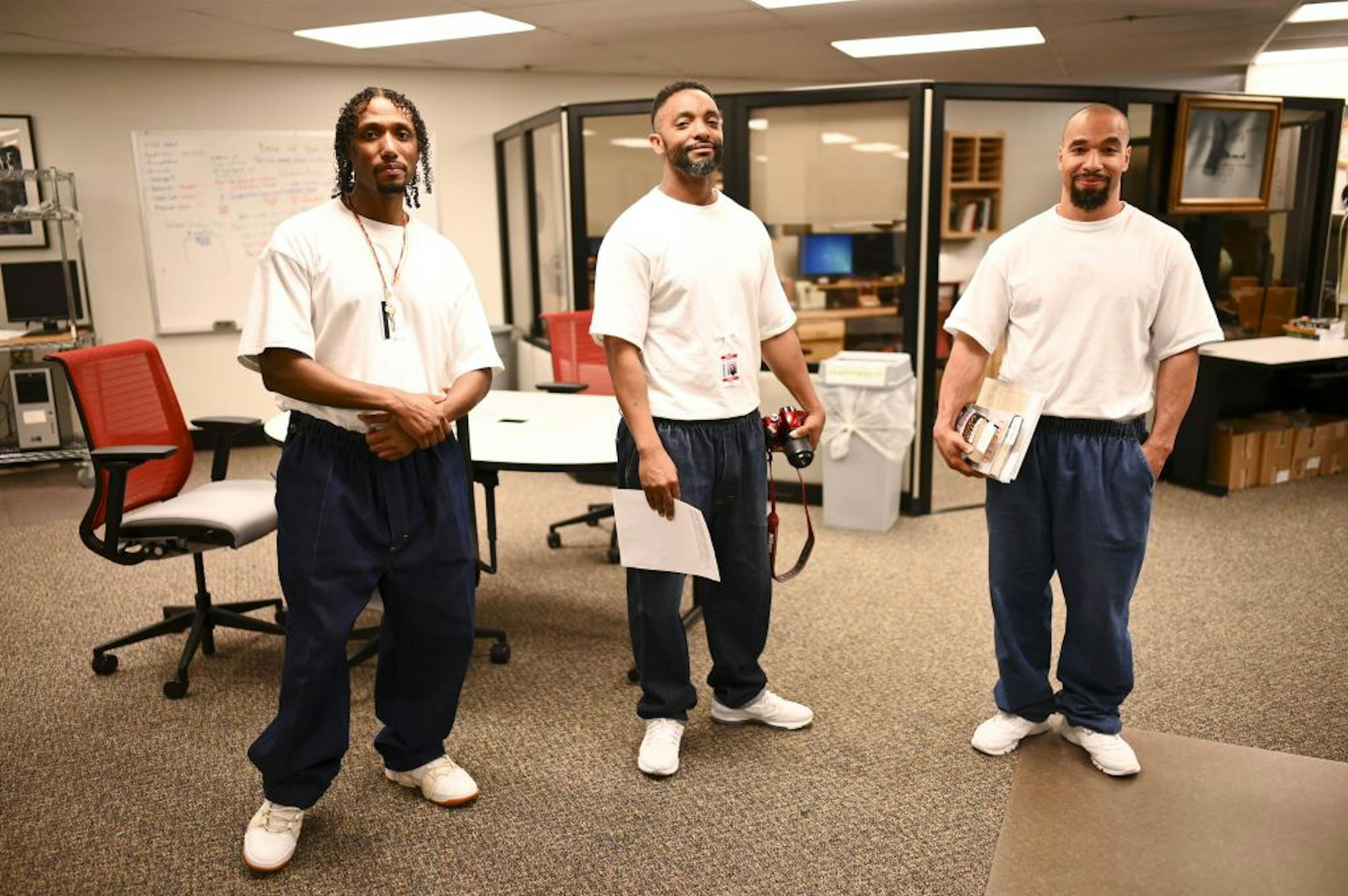 From left, Lennell Martin, Ronald Greer and Jeffery Young, co-editors of the Prison Mirror and inmates at the Stillwater Correctional Facility, stood for a portrait outside their newsroom Wednesday.