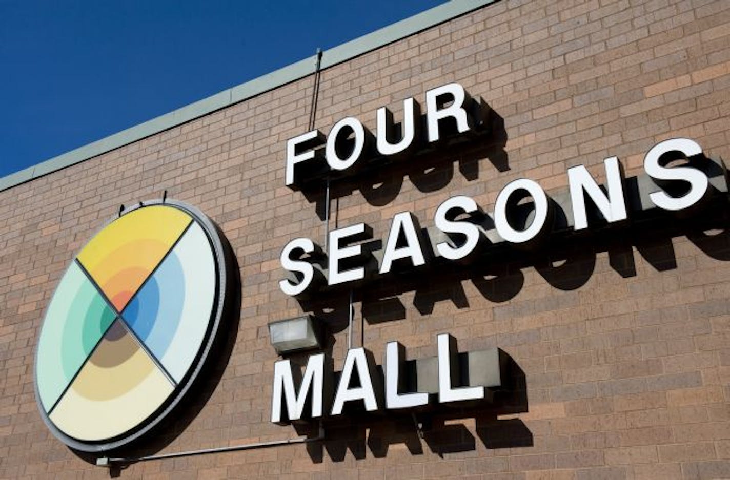 Wal-Mart is in talks to buy the 17-acre, Four Seasons Mall in Plymouth where most of the tenants have moved out.