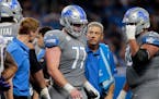 FILE - In this Sunday, Sept. 26, 2021, file photo, Detroit Lions center Frank Ragnow (77) walks to the sidelines after being injured in the second hal