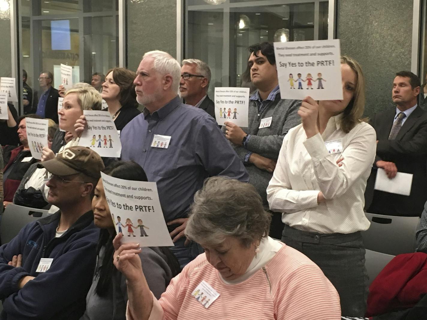 Angry residents of Forest Lake held up placards and some yelled, "Shame on you!" after city councilors voted to reject a psychiatric residential facility for children and adolescents.