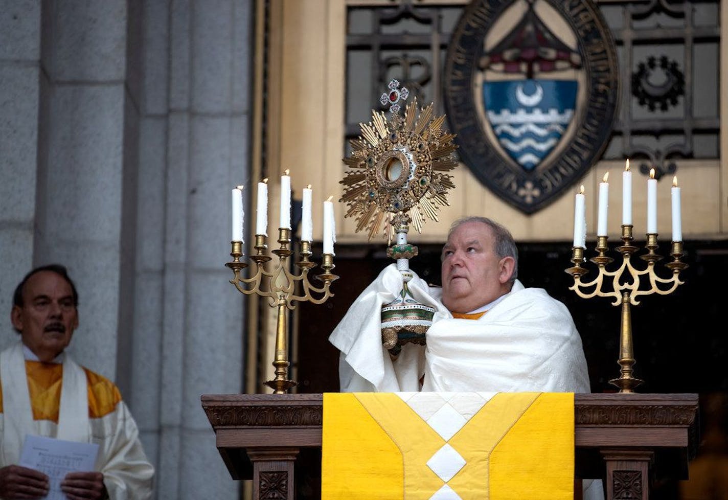 Archbishop Bernard Hebda delivered the Easter benediction as a livestream on the steps of the Basilica of St. Mary. Hebda announced that Catholic churches would resume services this Sunday, in defiance of the governor's pandemic plan. Jerry Holt/Star Tribune