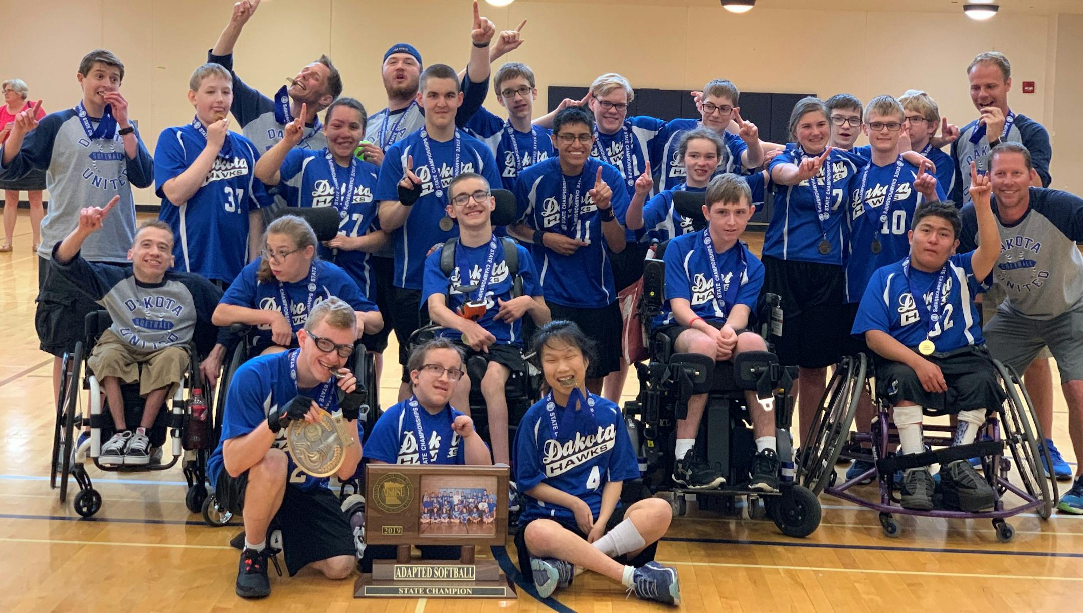 Dakota United physically impaired team, state champions in adapted softball, runner-up in adapted soccer. Photo taken after the softball championship onJune 1. Photo by Karla Sonnenberg, Apple Valley.