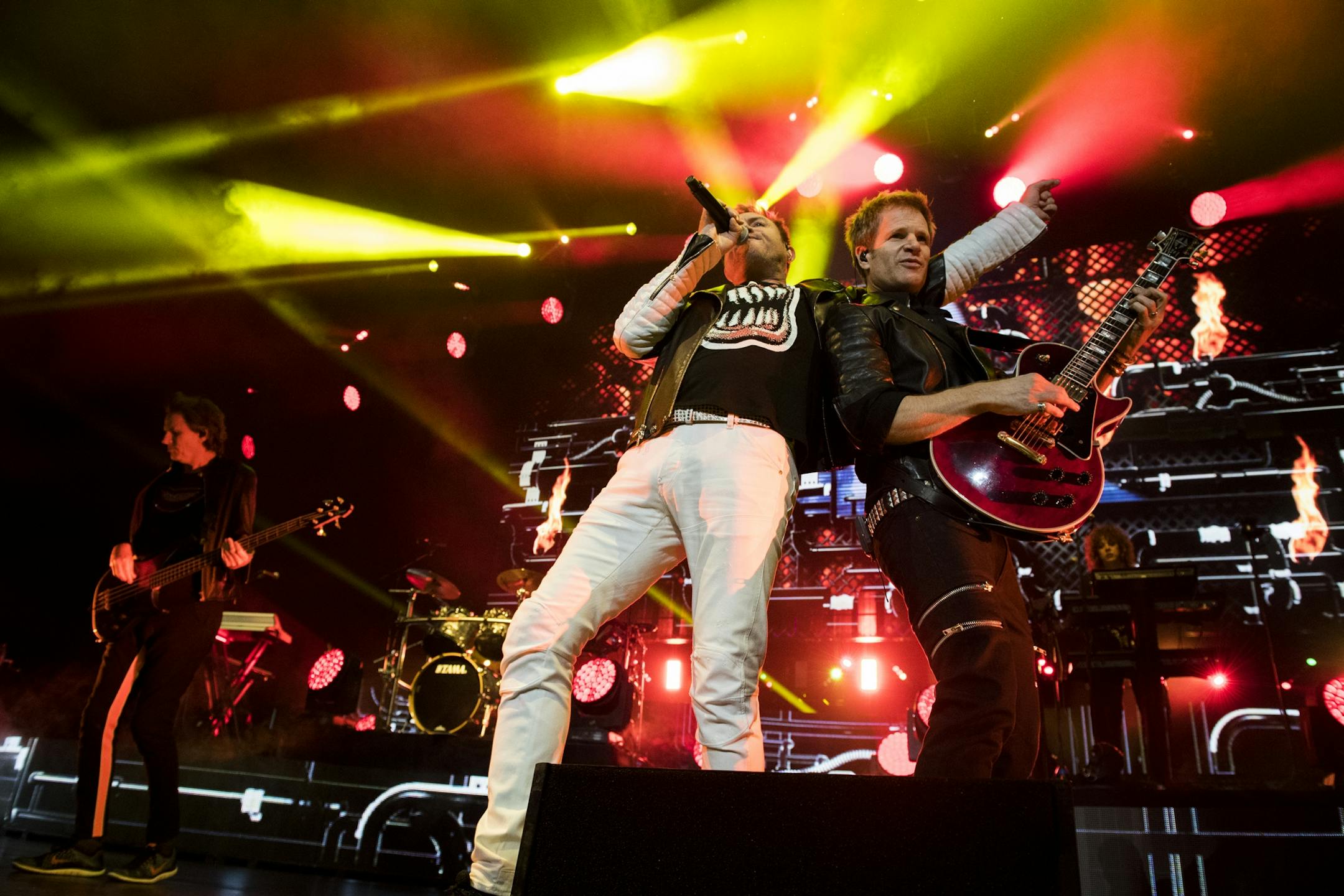 Simon Le Bon and Dominic Brown performed together as they played with the rest of Duran Duran at the Xcel Energy Center on Saturday night.