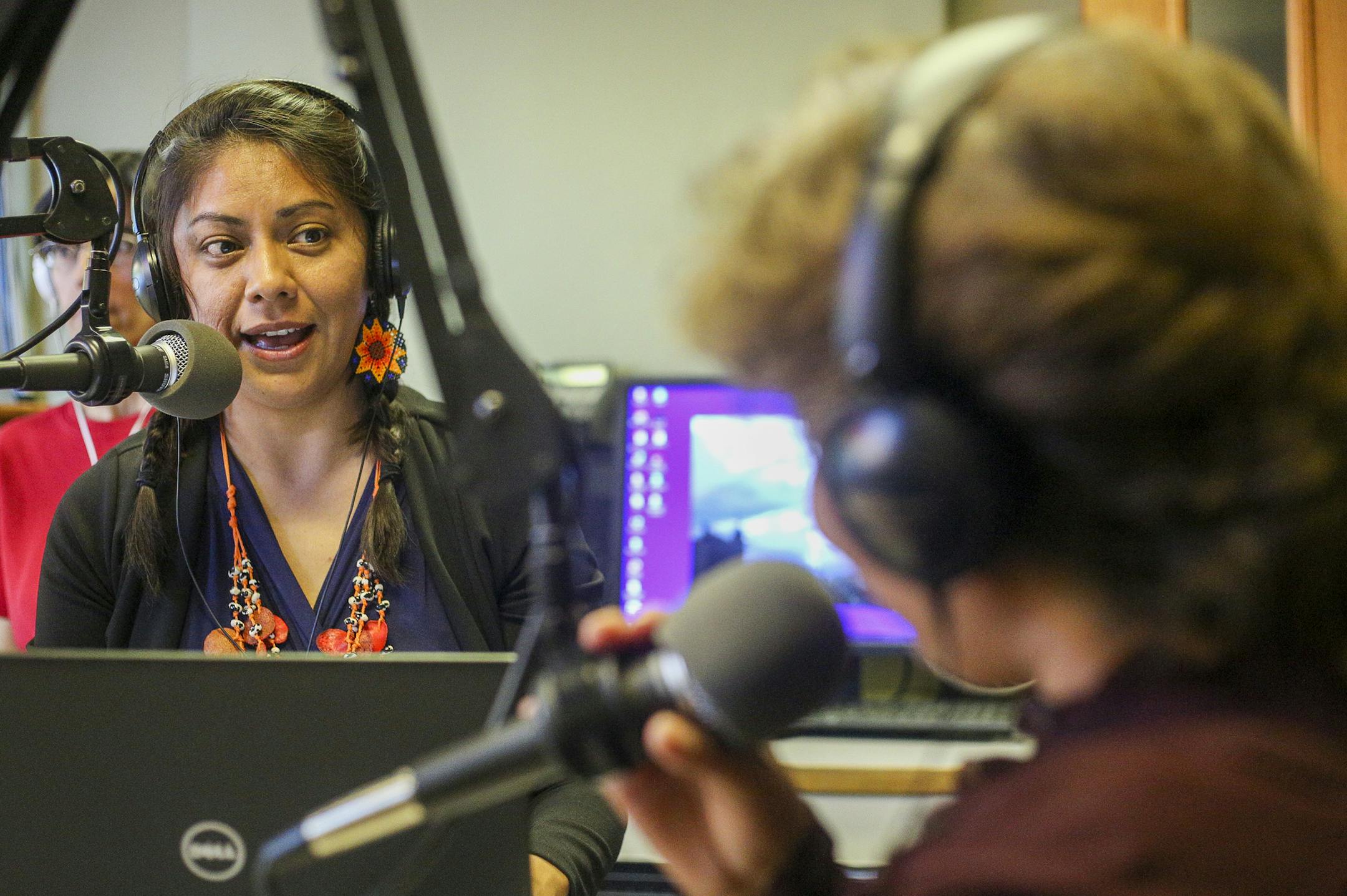 Marlene Rojas, left, and Lucina Gonz&#xe1;lez Mir&#xf3;n, right, speak during a segment on Hispanic culture. ] Timothy Nwachukwu &#x2022; timothy.nwachukwu@startribune.com Radio show "El Super Barrio Latino" goes live at KYMN Radio on Sunday, July 31, 2016 in Northfield. The show began in February 2016 to create a sense of community for Latinos in the Northfield area.