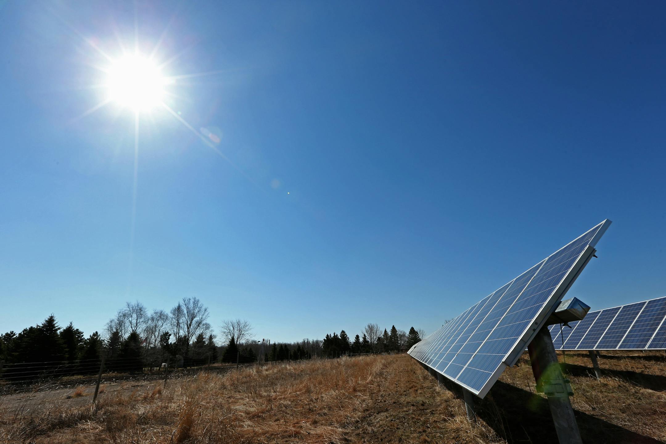 St. Johns University solar installation in fields next to the campus, photographed on 5/15/14. Profile of Geronimo Energy, a newcomer to renewable energy that has just won a giant bid to build a massive solar project for Xcel Energy. They have similar panels installed at St Johns - they 'track' the sun, - unlike St Johns. They will be installing these in unlikely ( inexpensive land ) places - like in the middle of freeway cloverleafs. Bruce Bisping/Star Tribune bbisping@startribune.com