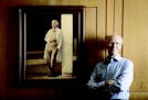 Peter Salk, whose father conquered polio, says coronavirus fight is far from over. He's seen near a photo of his famous father at the Salk Institute f