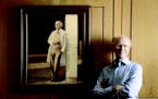 Peter Salk, whose father conquered polio, says coronavirus fight is far from over. He's seen near a photo of his famous father at the Salk Institute f