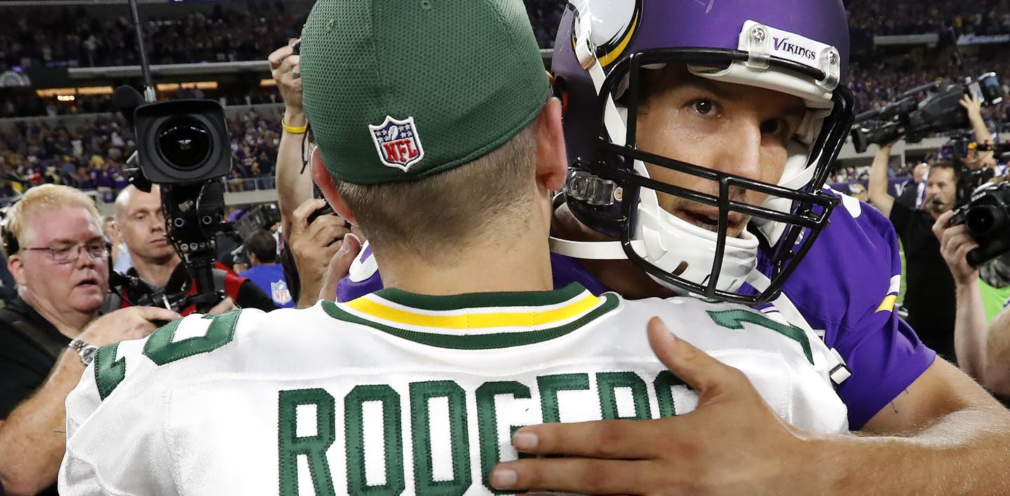 Green Bay Packers quarterback Aaron Rodgers (12) and Minnesota Vikings quarterback Sam Bradford greeted each other at the end of the game. ] CARLOS GONZALEZ cgonzalez@startribune.com - September 18, 2016, Minneapolis, MN, US Bank Stadium, NFL, Minnesota Vikings vs. Green Bay Packers