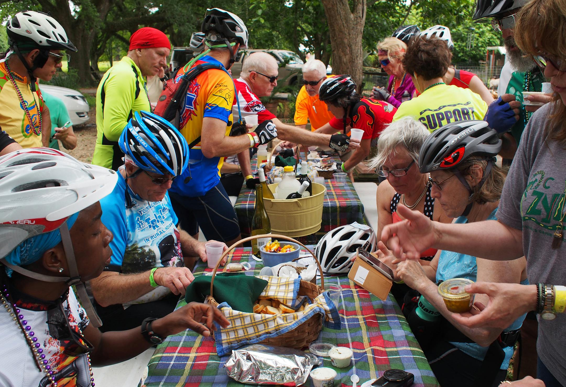 Food and beverage stops are frequent during the trip: Cyclists visit Belle Ecorce Farms, where they sample goat cheese made there.