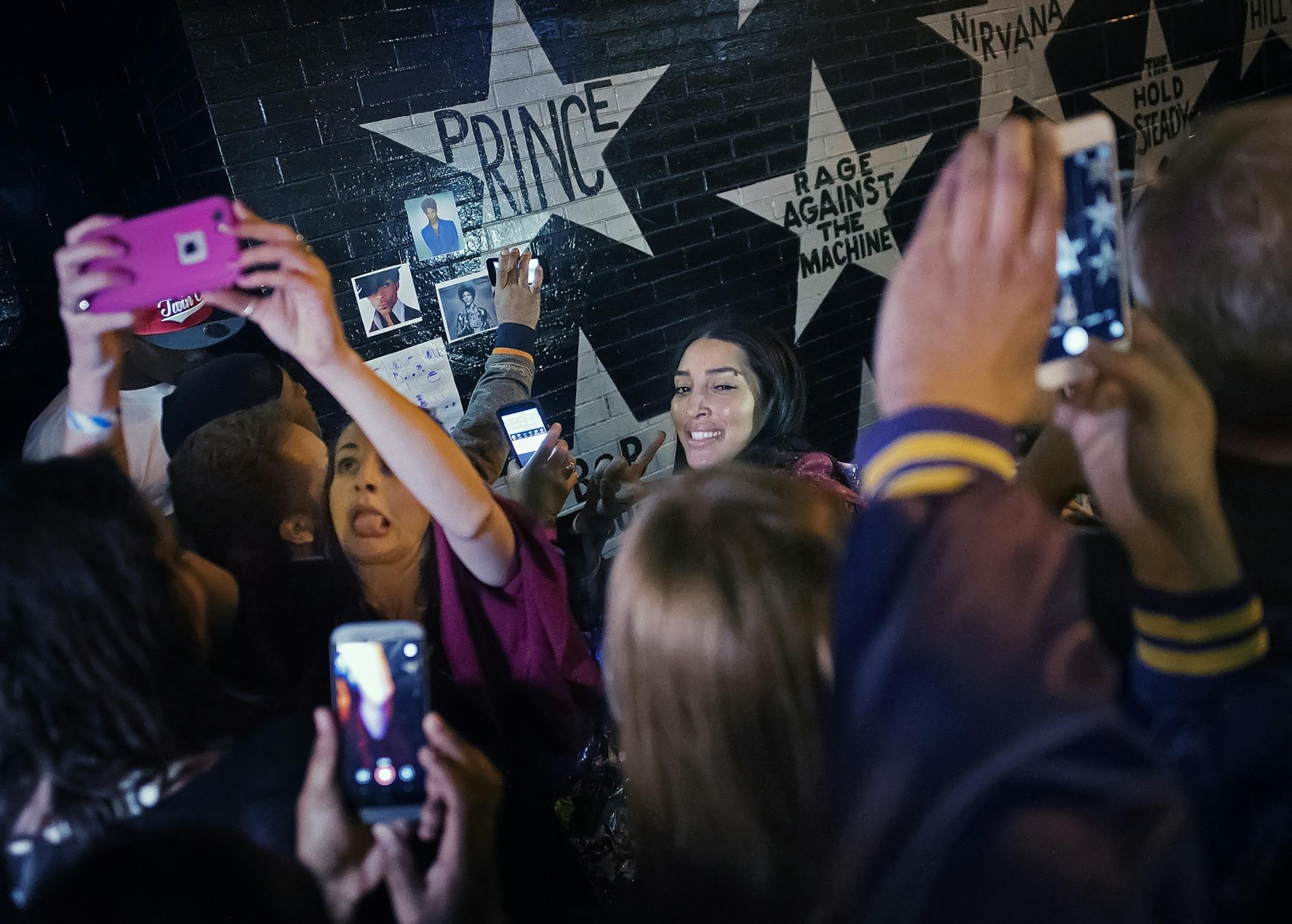 At First Ave where "Purple Rain" was filmed, fans of Prince paid tribute to the pop icon who passed away.