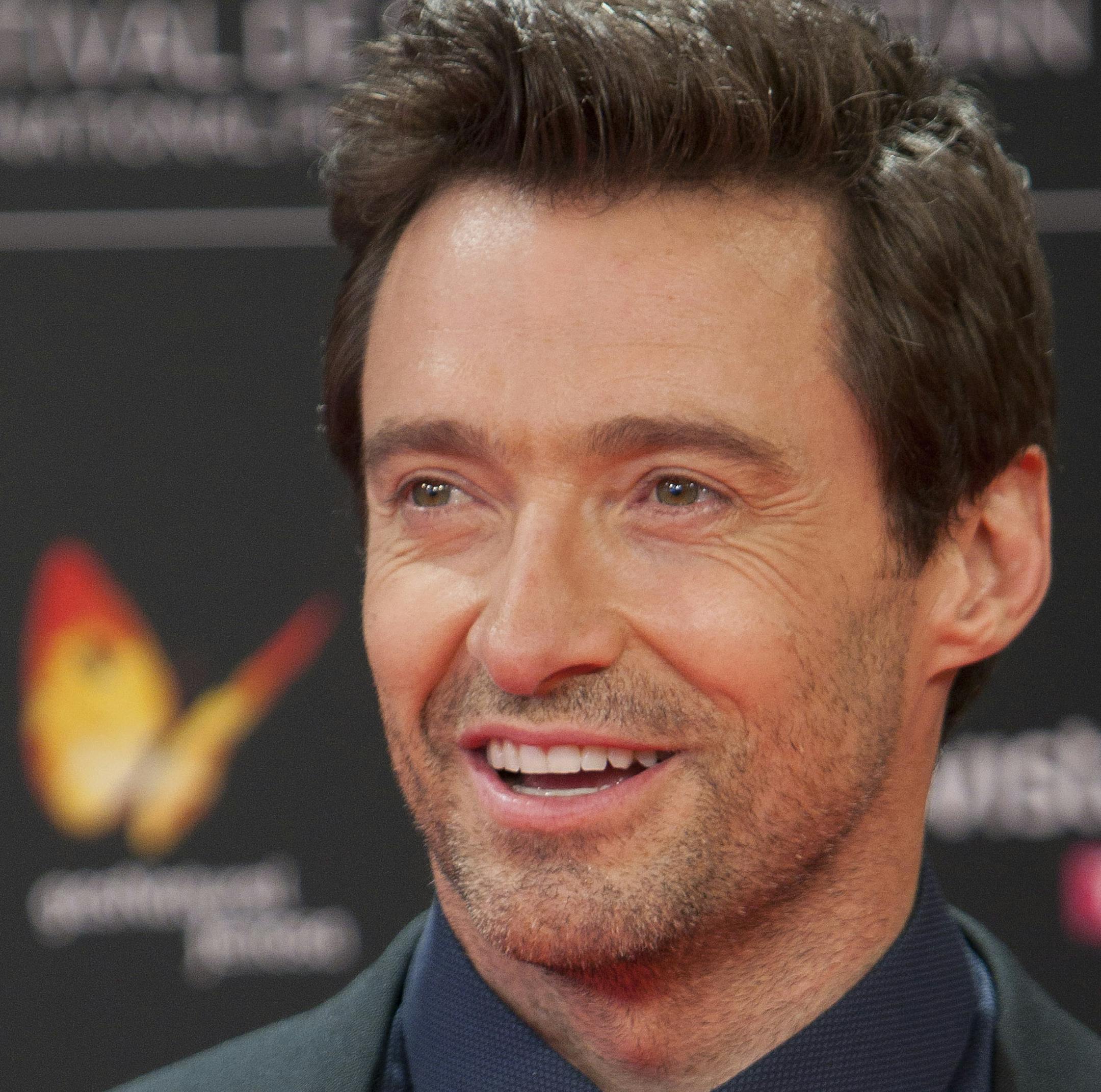 Australian actor Hugh Jackman poses at the photocall of the premiere of the film "Prisoners" before receiving Donostia Award at the 61st San Sebastian Film Festival in San Sebastian, Spain, Friday, September. 27, 2013. (AP Photo / Abraham Caro Marin)