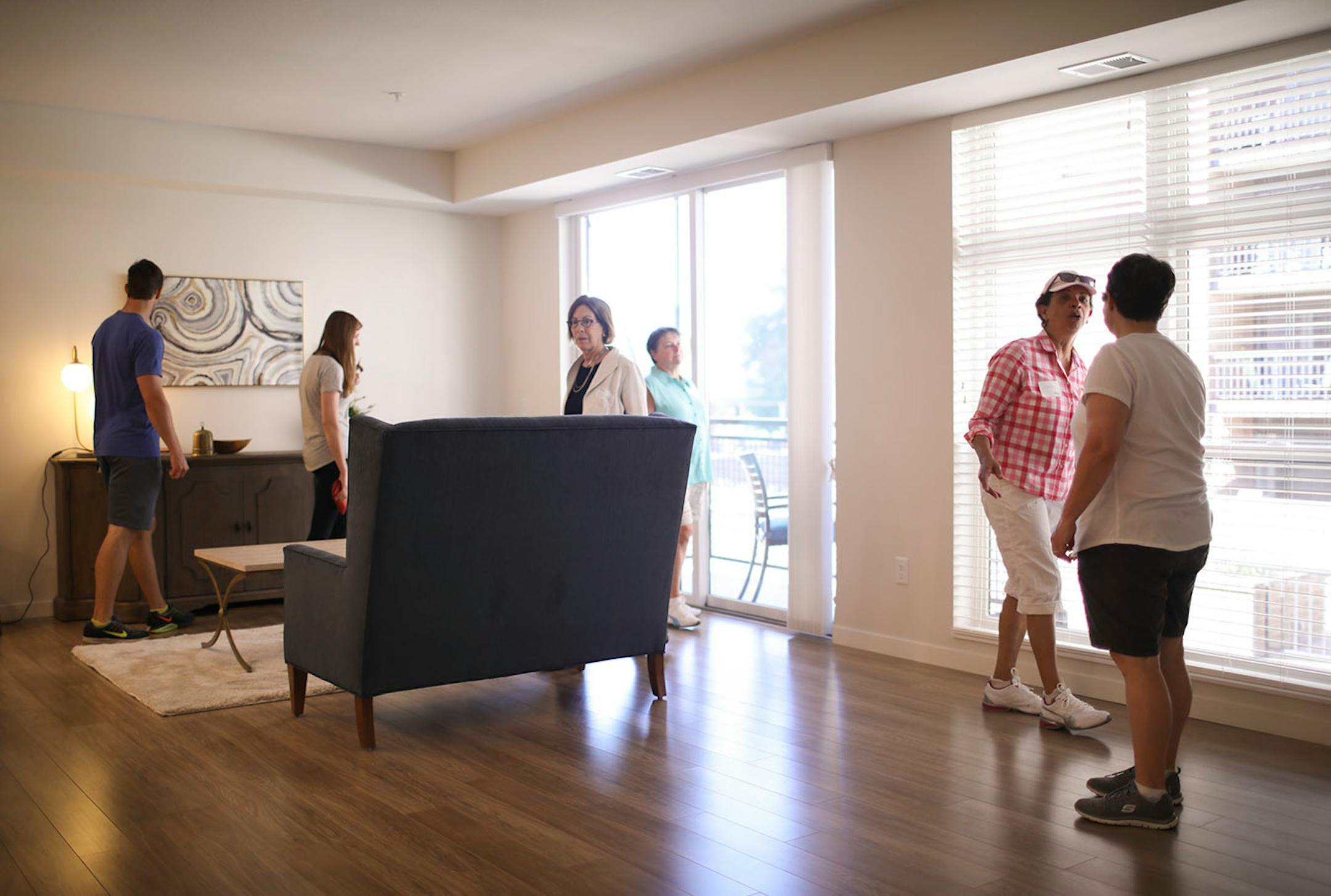 People on a tour of Abiitan Mill City looked at the two bedroom, two bath model.