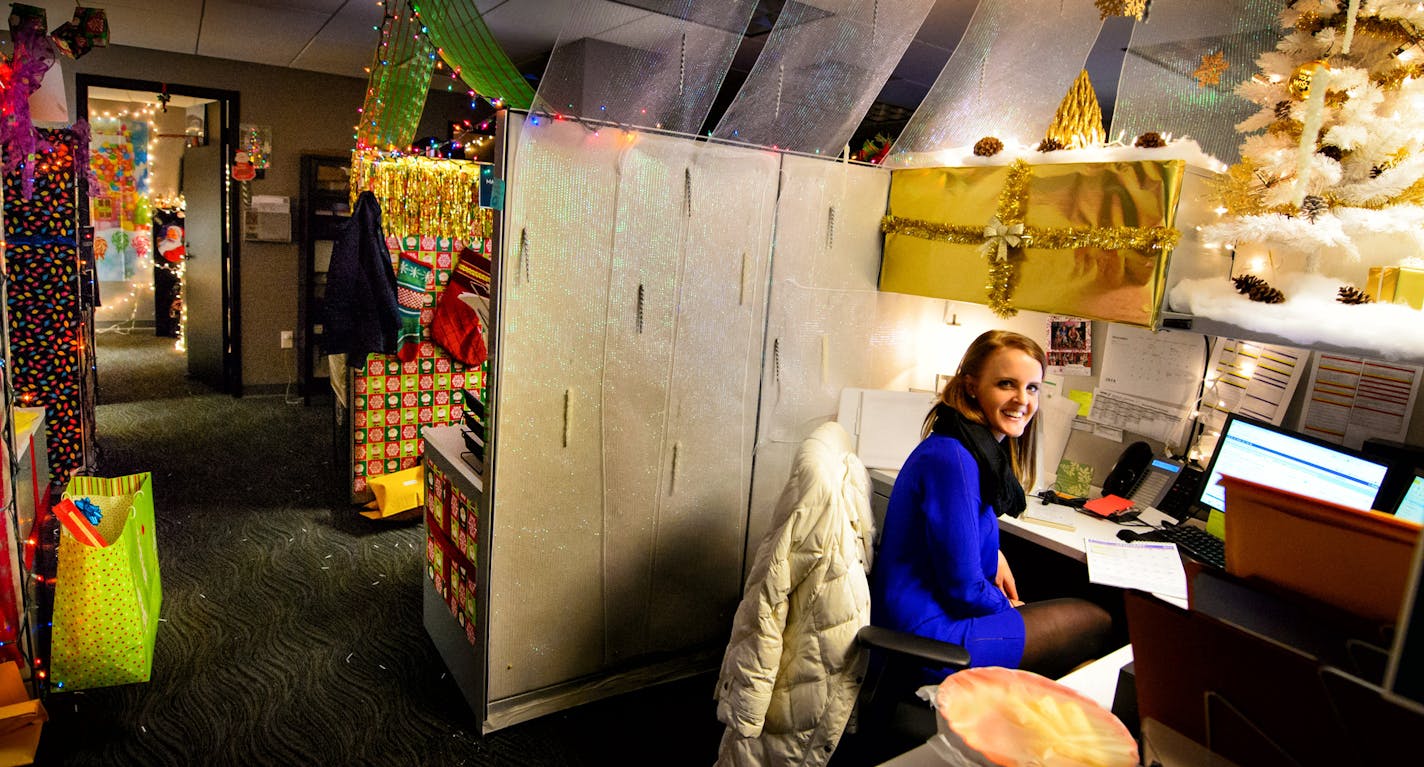 Abby Ingram took third prize in the cubicle decorating contest at the W Minneapolis The Foshay. ] GLEN STUBBE * gstubbe@startribune.com Monday, December 22, 2014 The "W" (Foshay tower) is having its first cube decorating contest among sales crew. Angela Westfield spent hours turning hers into a Christmas cabin. EDS, Angela Westfield hasher back to the column.