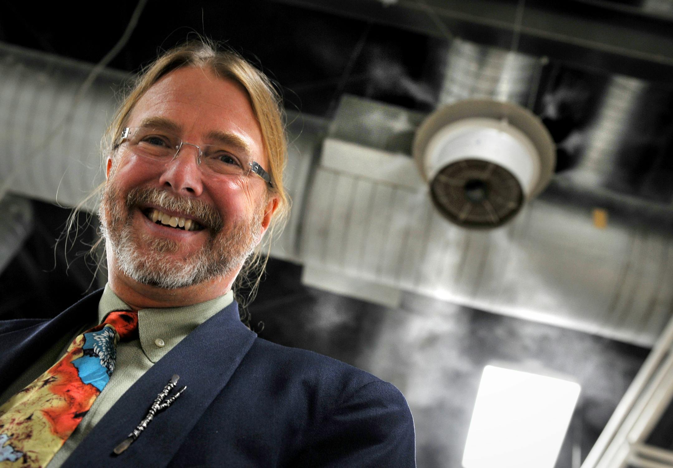 With water misters like the one over his head, dik Bolger said he saved over $46,000 in the first nine months they were use at Bolger Printing. they used to rely on old fashioned boilers to keep the winter humidity at 42 percent, necessary to keep down static electricity.