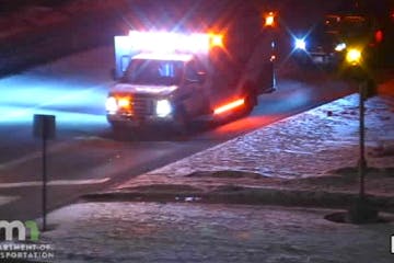 Ambulance at shooting scene Saturday in Golden Valley.   