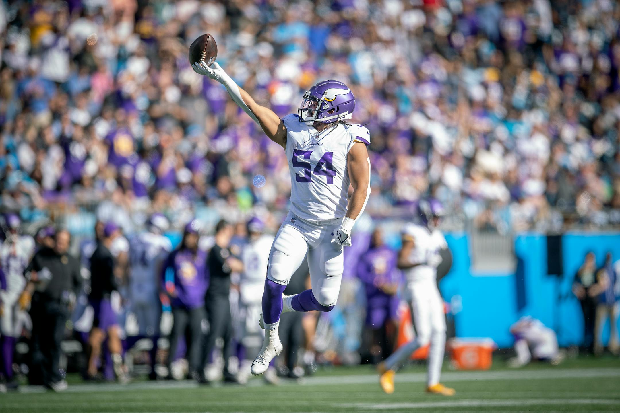 Vikings middle linebacker Eric Kendricks (54) celebrated after he recovered a fumble after Vikings free safety Xavier Woods (23) forced a fumble on a tackle on Panthers wide receiver D.J. Moore (2) during the third quarter, Sunday, October 17, 2021 in Charlotte.