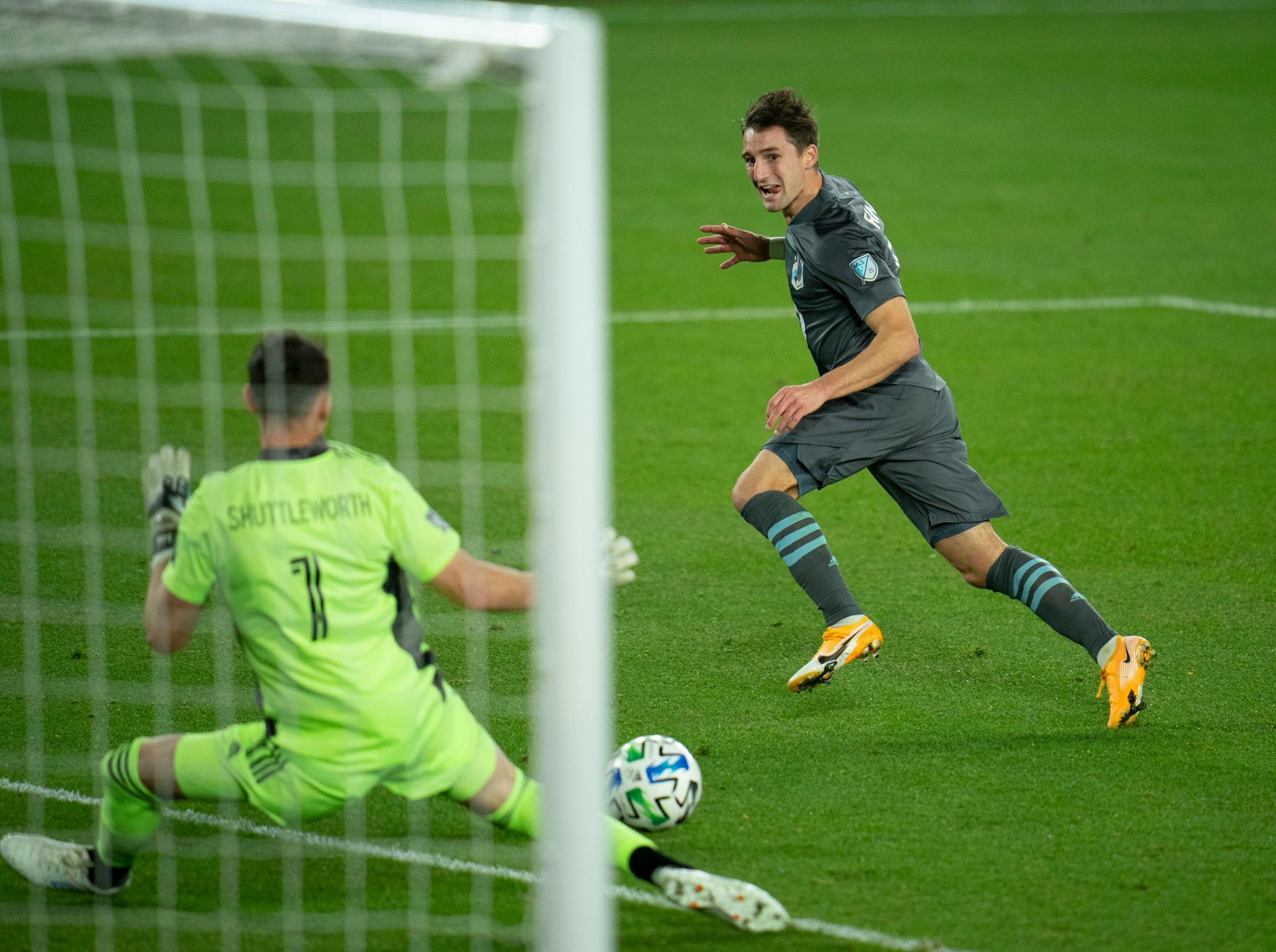 Minnesota United midfielder Ethan Finlay watched his first half shot on goal head towards Chicago Fire goalkeeper Bobby Shuttleworth