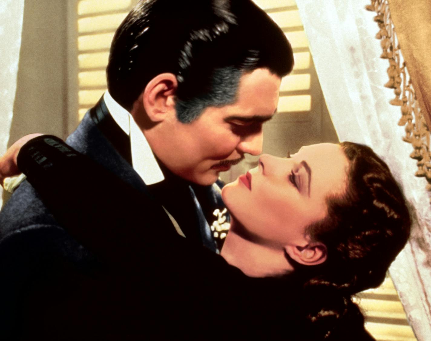 This image released by Turner Classic Movies shows Clark Gable, left, and Vivien Leigh in a scene from "Gone with the Wind." On Thursday, the TCM Classic Film Festival will open its 10th annual edition in Los Angeles with &#x201c;When Harry Met Sally...&#x201d; To mark its anniversary, TCM will on Sunday again air &#x201c;Gone With the Wind,&#x201d; the film that it first transmitted on April 14, 1994. (Turner Classic Movies via AP)