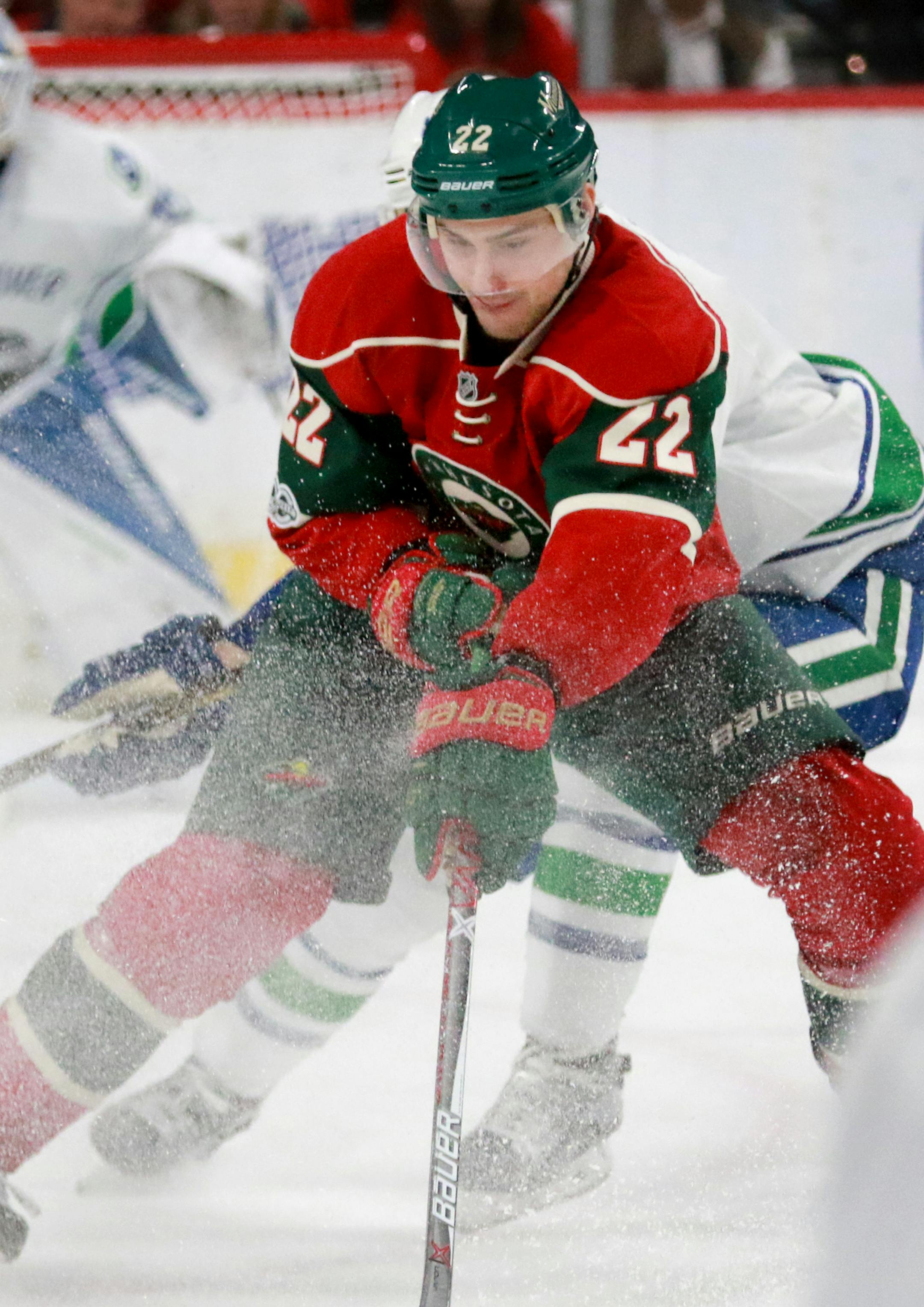 The Minnesota Wild's Nino Niederreiter (22) controls the puck against the Vancouver Canucks in the second period Saturday, March 25, 2017, at the Xcel Energy Center in St. Paul, Minn. The Canucks won, 4-2.] DAVID JOLES ï david.joles@startribune.com Minnesota Wild and Canucks