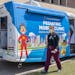 HCMC staff visit Hennepin Healthcare's mobile pediatric van outside the hospital in 2022.