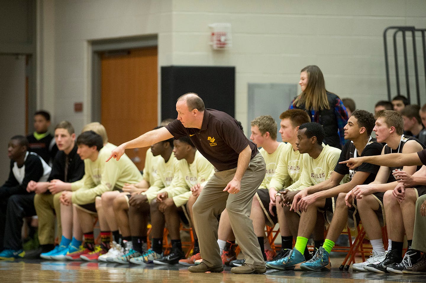 Apple Valley head coach Zach Goring directs the team during the second half against Cretin-Derham Hall. ] (Aaron Lavinsky | StarTribune) Cretin-Derham Hall plays against Apple Valley in the Section 3 Class 4A boys' basketball final at Farmington High School on Thursday, March 5, 2015.