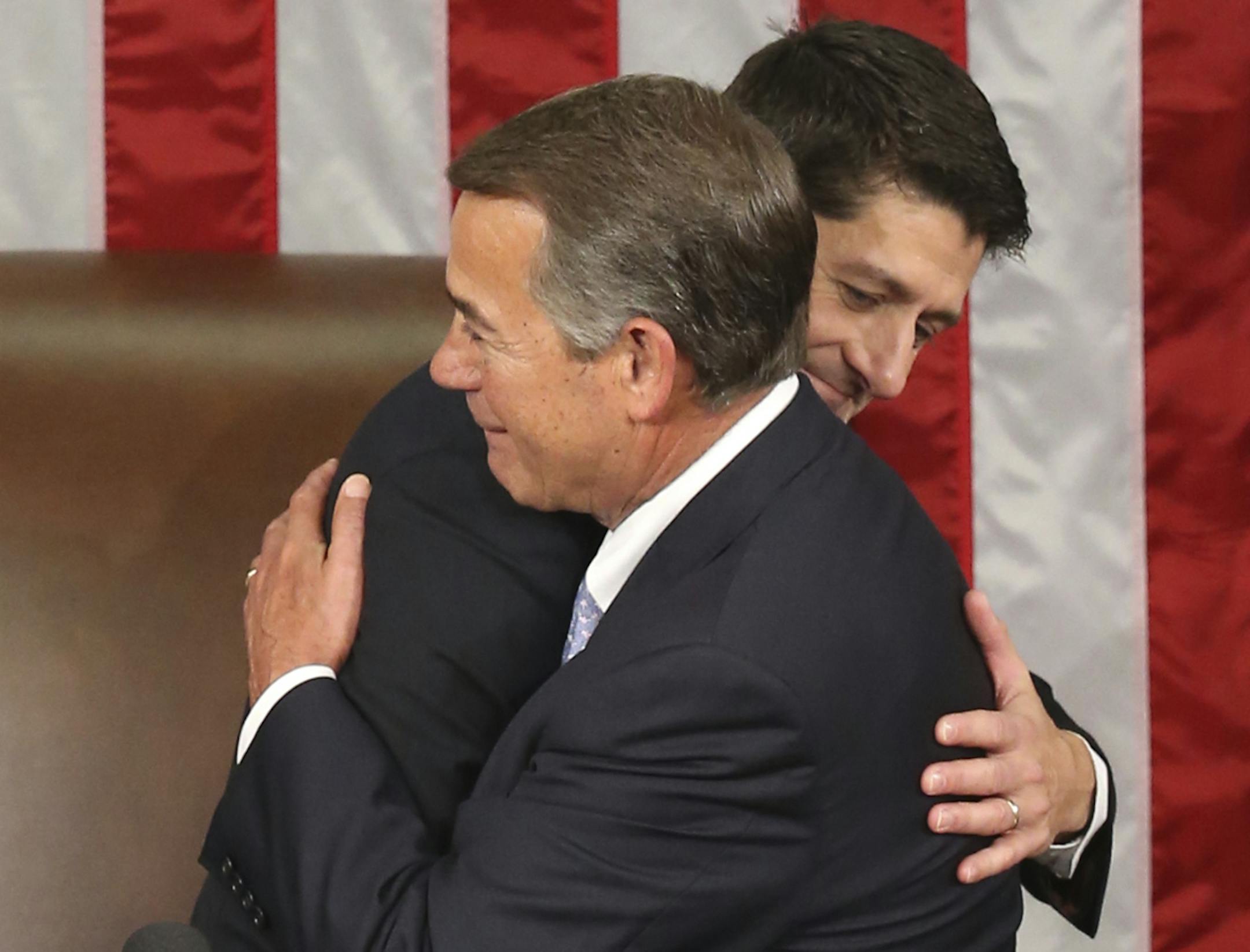 Outgoing House Speaker John Boehner hugs his successor Rep. Paul Ryan, R-Wis. in the House Chamber on Capitol Hill in Washington, Thursday, Oct. 29, 2015. Republicans rallied behind Ryan to elect him the House's 54th speaker on Thursday as a splintered GOP turned to the youthful but battle-tested lawmaker to mend its self-inflicted wounds and craft a conservative message to woo voters in next year's elections. (AP Photo/Andrew Harnik)