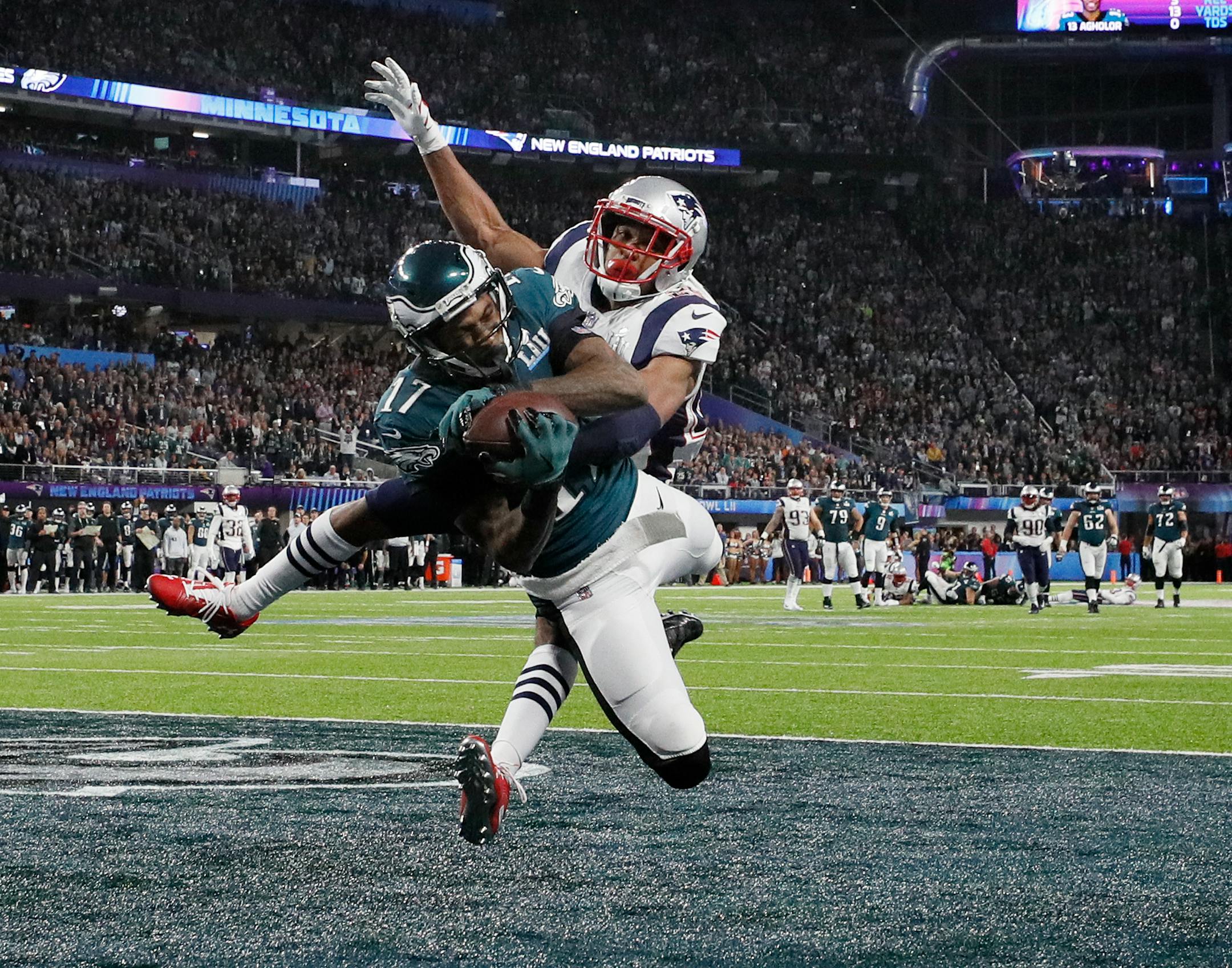 Philadelphia Eagles receiver Alshon Jeffery hauled in a 34-yard touchdown pass from quarterback Nick Foles in Super Bowl LII as Eric Rowe of the New England Patriots defended. The score gave the Eagles a 9-3 lead after the extra point was missed. ] Carlos Gonzalez � Carlos. Gonzalez@startribune.com The New England Patriots met the Philadelphia Eagles in Super Bowl LII Sunday evening, February 4, 2017 at U.S. Bank Stadium in Minneapolis.