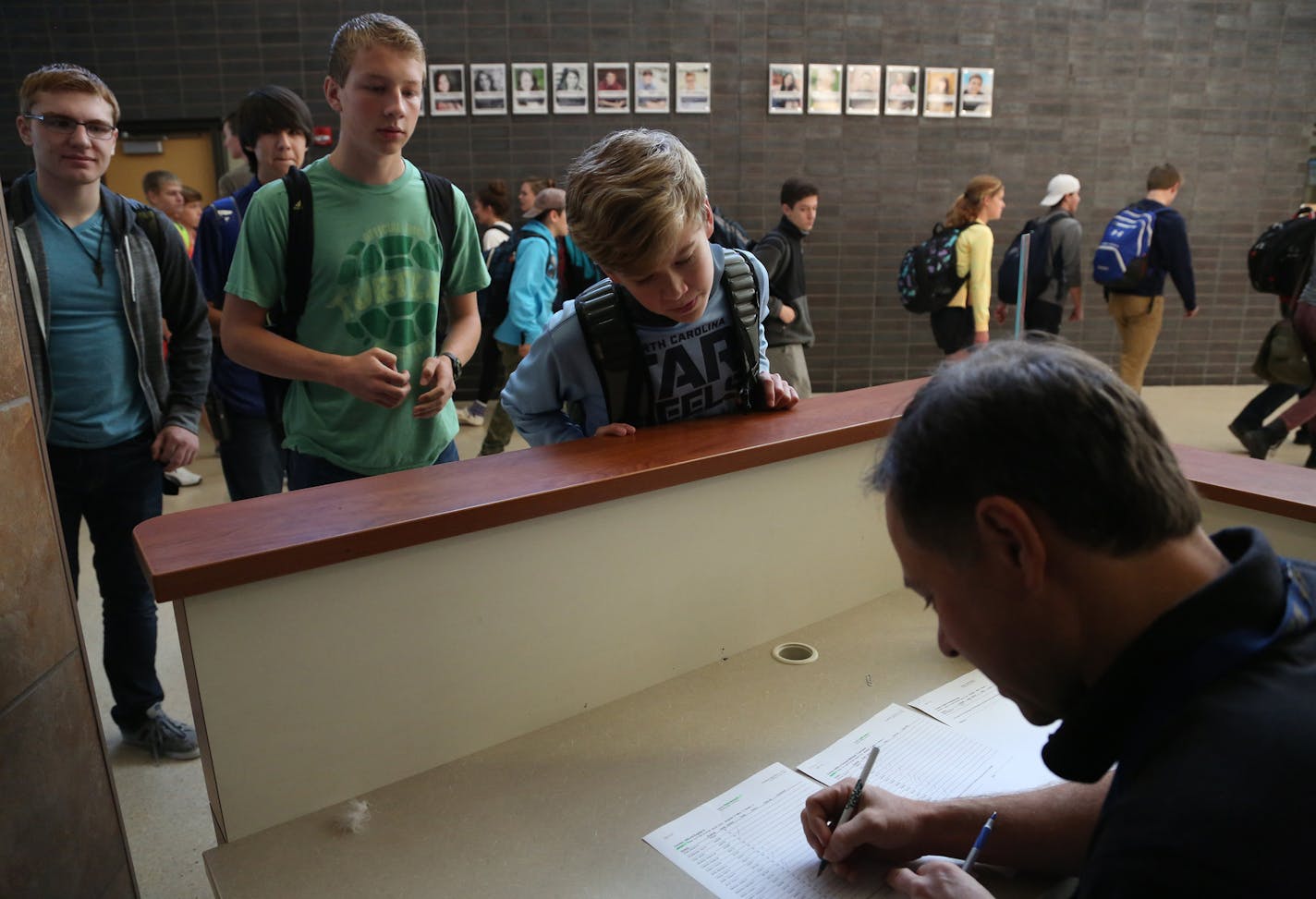 Cort Watschke checked in with teacher Brad Bienkowski for flex time due to an English teacher's absence. ] (KYNDELL HARKNESS/STAR TRIBUNE) kyndell.harkness@startribune.com A look at flex time at Chanhassen High School in Chanhassen Min., Tuesday November 3, 2015.