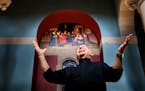 Rev. Joseph Weiss with the mural of St. Thomas More and his family. ] GLEN STUBBE * gstubbe@startribune.com Tuesday, June 21, 2016, On Sunday, parishi