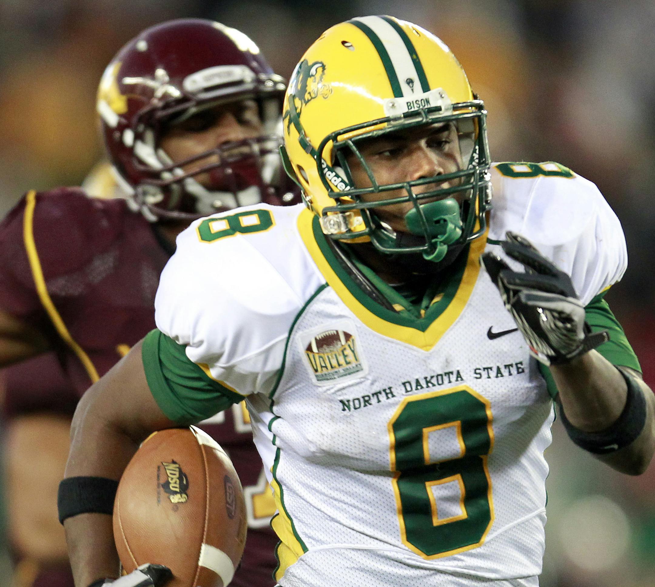 NDSU running back Wes Hudson (6) ran away from Minnesota defenders during a long run in the second quarter that set up a touchdown. ] CARLOS GONZALEZ cgonzalez@startribune.com , September 24, 2011, Minneapolis, Minn, TCF Bank Stadium, NCAA Football, University of Minnesota Gophers vs. North Dakota State Bison ORG XMIT: MIN2016090920273757