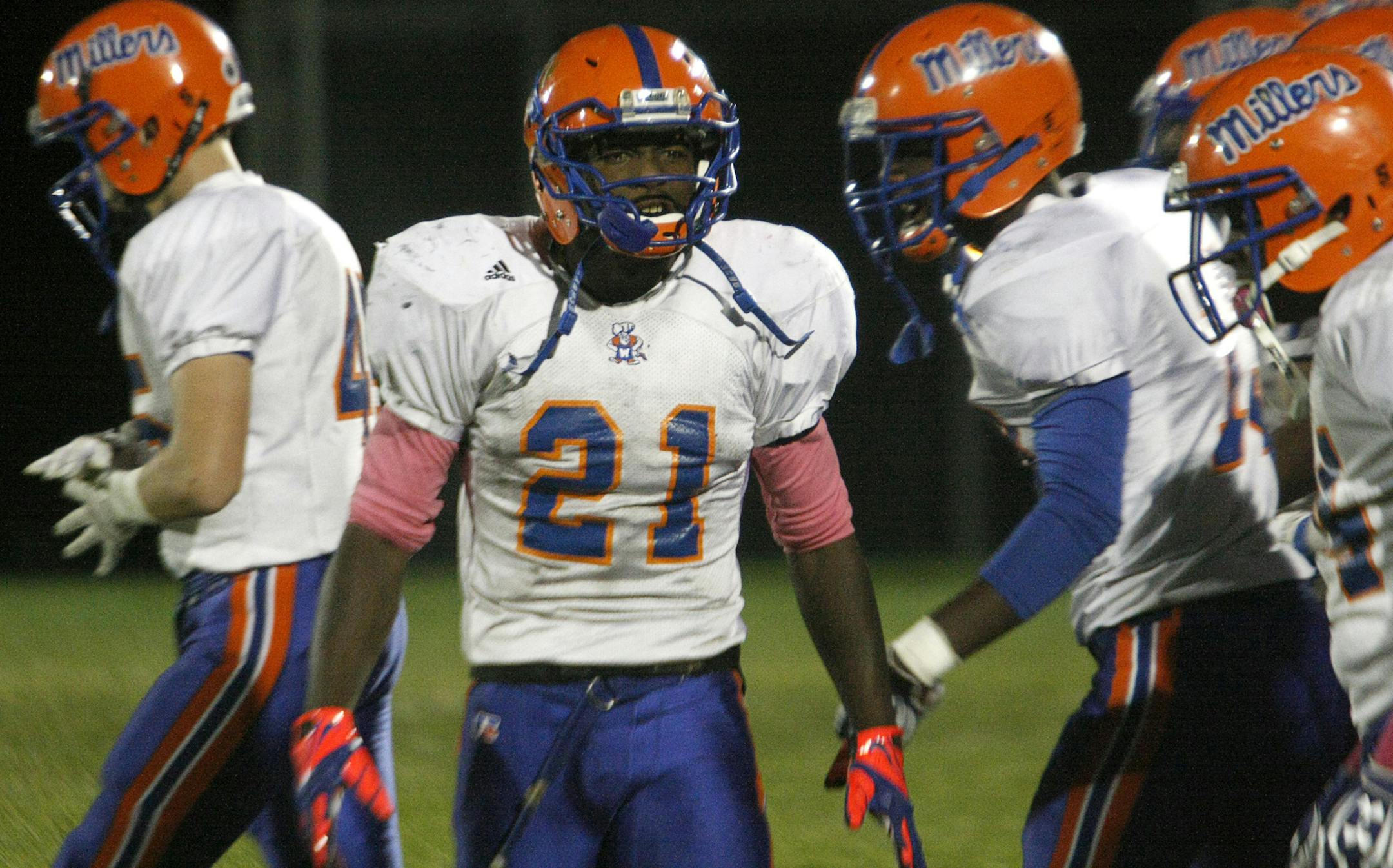 Washburn running back Jeffrey Jones cheers on his teammates during the Millers 41-7 victory at Southwest high school in Minneapolis on Friday, October 11. Jones scored five touchdowns in the game. ] Chris Kelleher, Special to the Star Tribune, 10/11/2013, Minneapolis, MN.