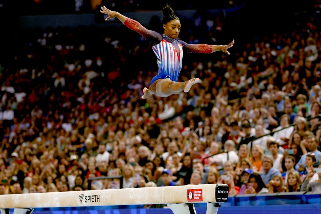Simone Biles competes on the balance beam on Day 2 of the U.S. Gymnastics Olympic Trials at Target Center.