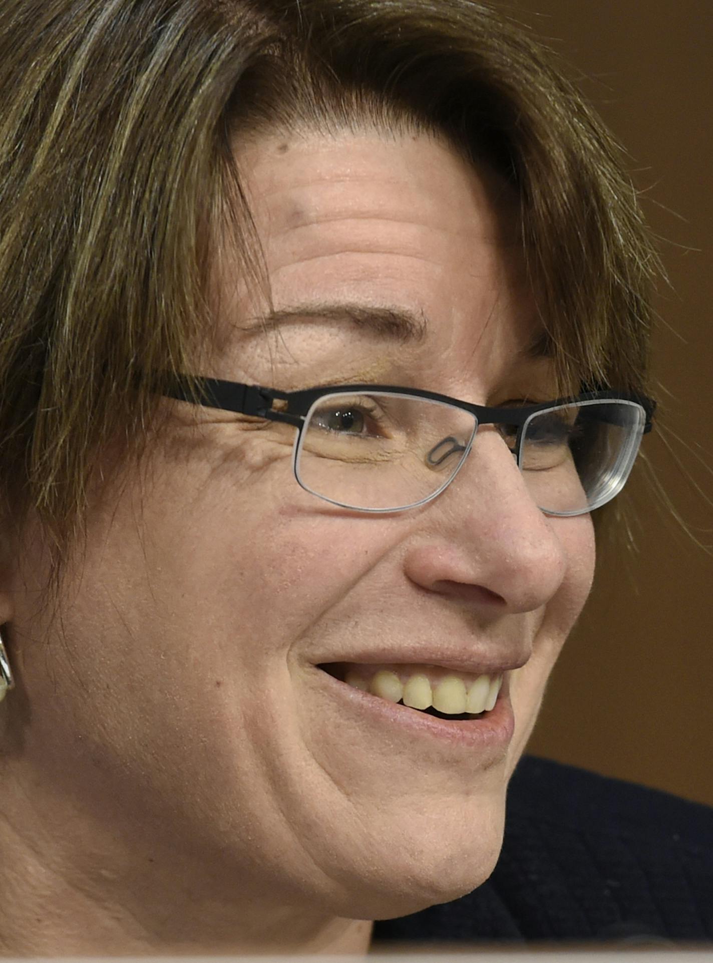 FILE - In this Jan. 28, 2015 file photo, Sen. Amy Klobuchar, D-Minn. is seen on Capitol Hill in Washington. Klobuchar is a possible pick by President Obama as a candidate to fill the Supreme Court seat of the late Justice Antonin Scalia. (AP Photo/Susan Walsh)