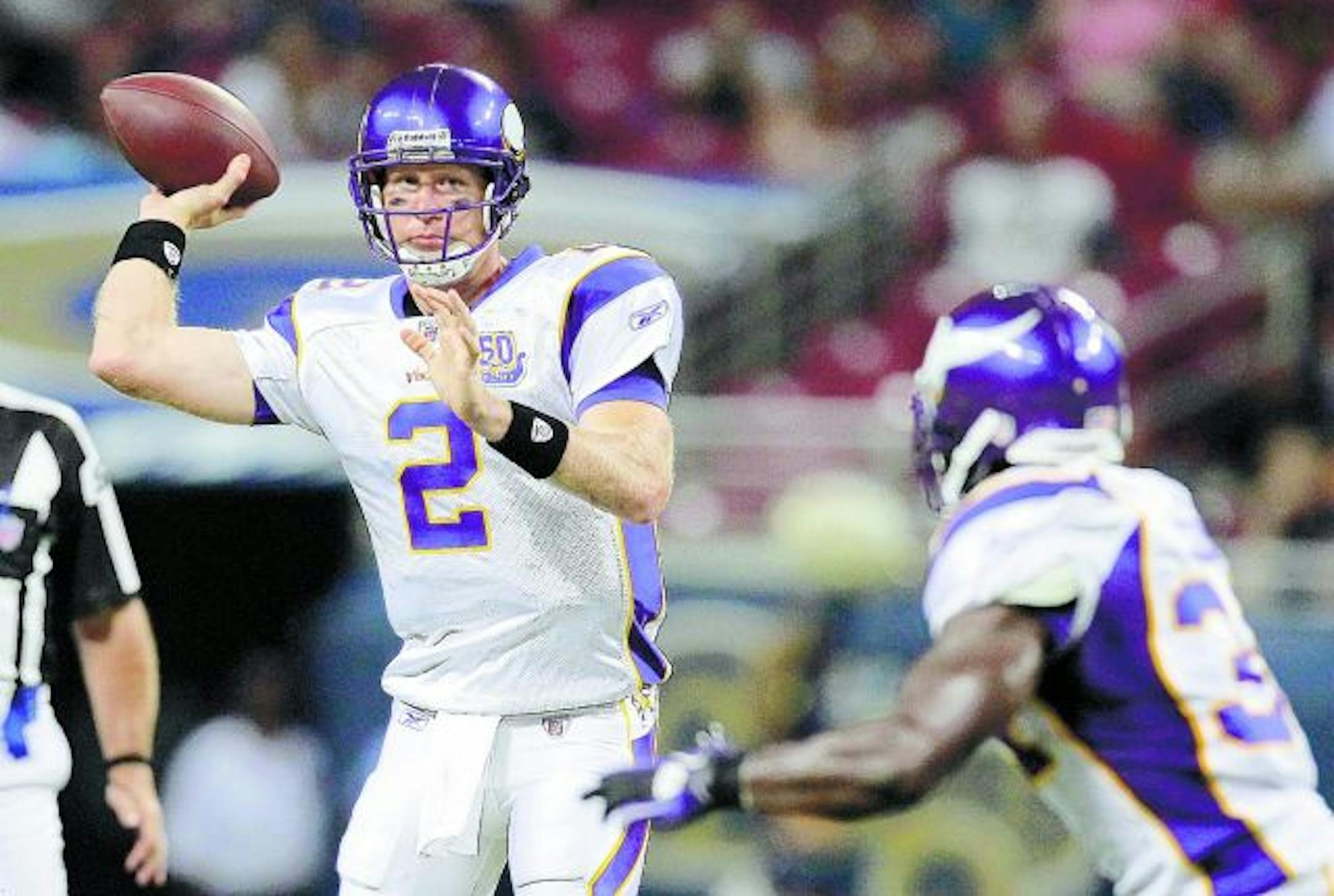 Minnesota Vikings quarterback Sage Rosenfels (2) throws to teammate running back Albert Young, right, during the first quarter of a preseason NFL football game against the St. Louis Rams Saturday, Aug. 14, 2010, in St Louis. The Vikings won 28-7.