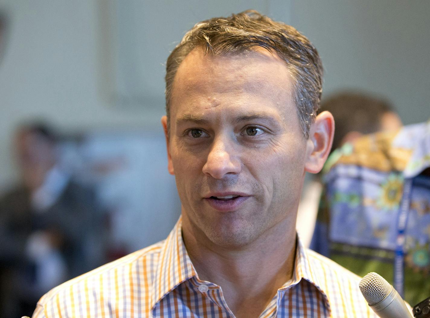 Chicago Cubs general manager Jed Hoyer speaks with members of the media after baseball general managers meetings, Tuesday, Nov. 10, 2015, in Boca Raton, Fla. (AP Photo/Wilfredo Lee) ORG XMIT: FLWL104