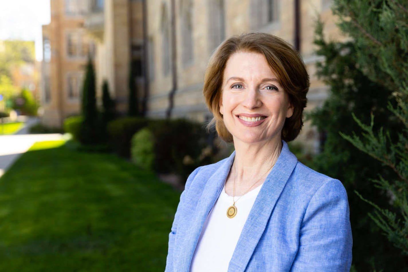 Environmental portrait of Laura Dunham, dean of the Opus College of Business, taken on May 16, 2022, in St. Paul.