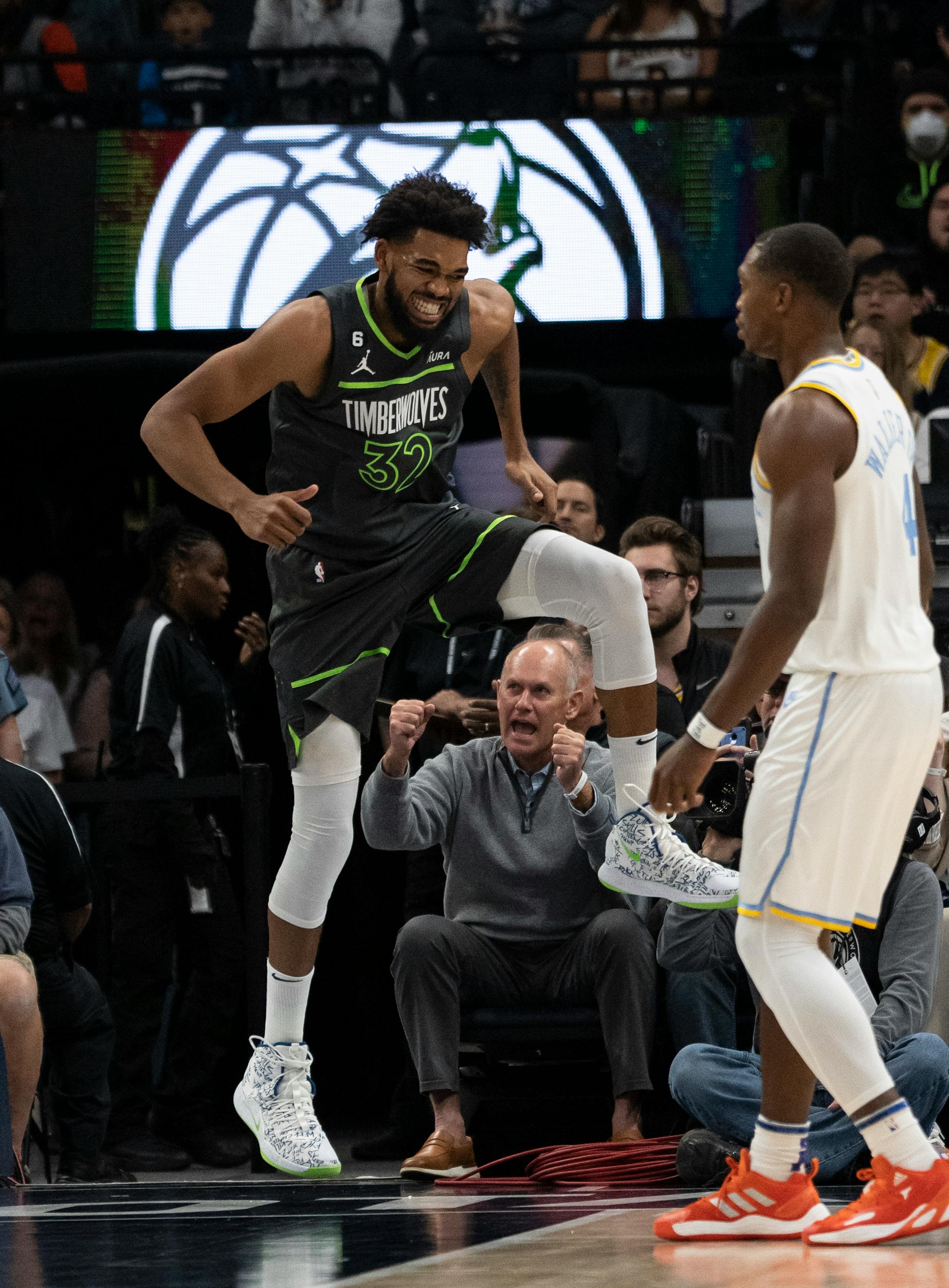 Minnesota Timberwolves center Karl-Anthony Towns (32) celebrates a breakaway shot in the first quarter.