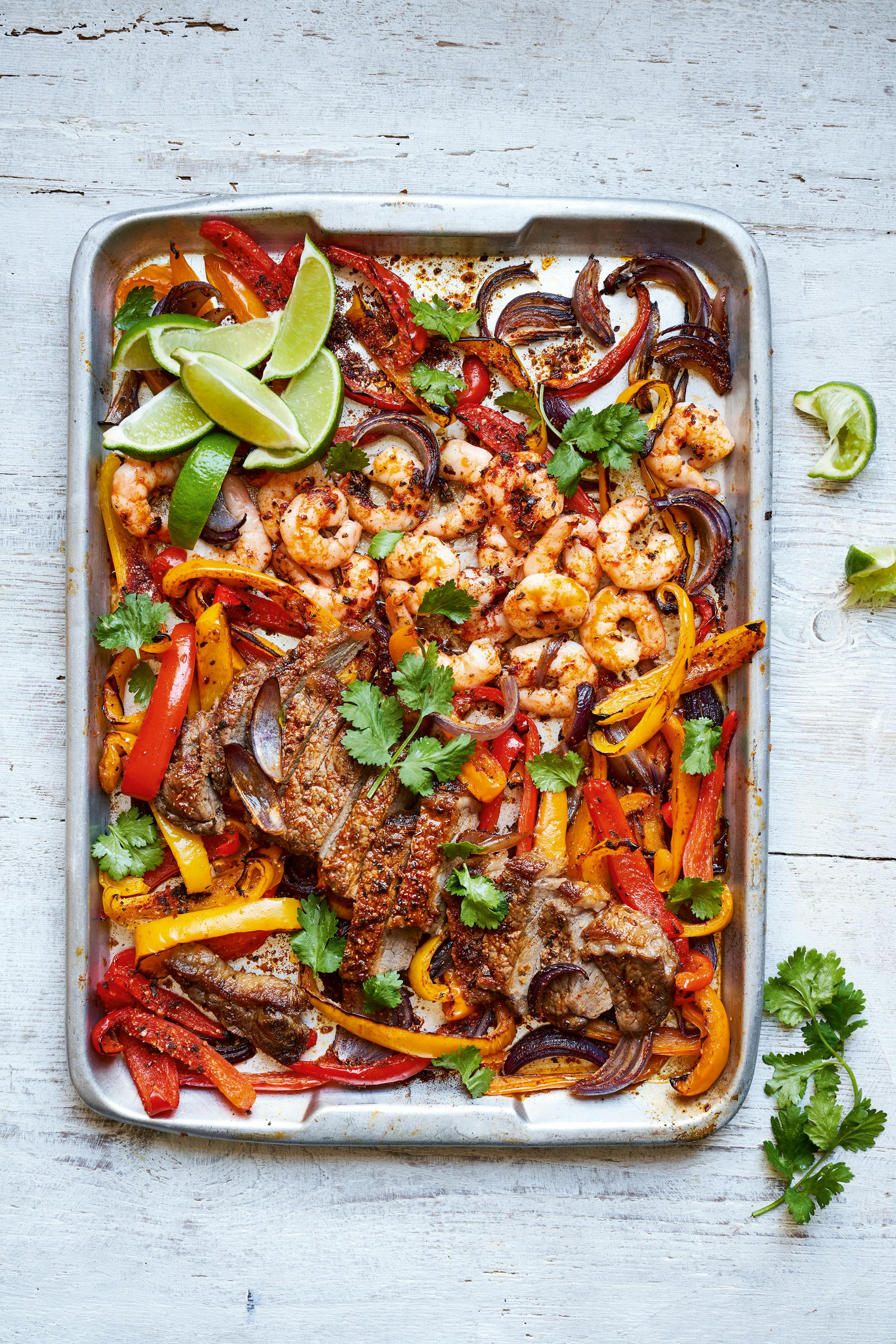 Surf 'n Turf Traybake is a quick meal that feels special. From "The Slimming Foodie in Minutes," by Pip Payne (Aster, 2023) Credit: Chris Terry