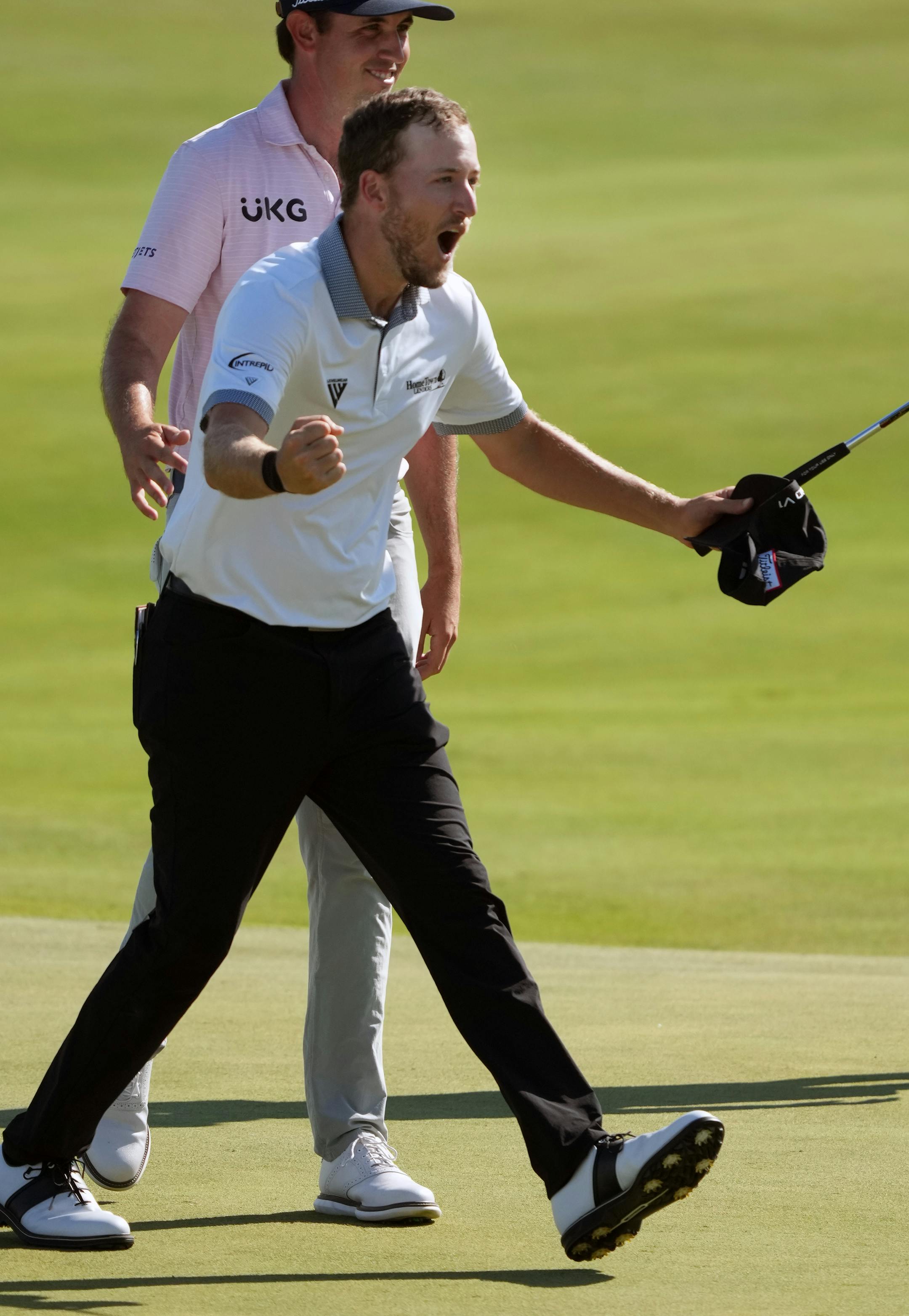 Lee Hodges celebrates his wire-to-wire 3M Open win on the 18th hole of TPC Twin Cities in Blaine on Sunday.
