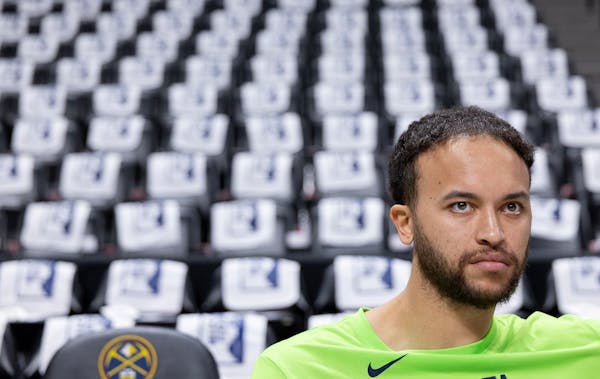 Kyle Anderson of the Wolves thinks deep thoughts before Game 5 at Denver's Ball Arena on Tuesday night.