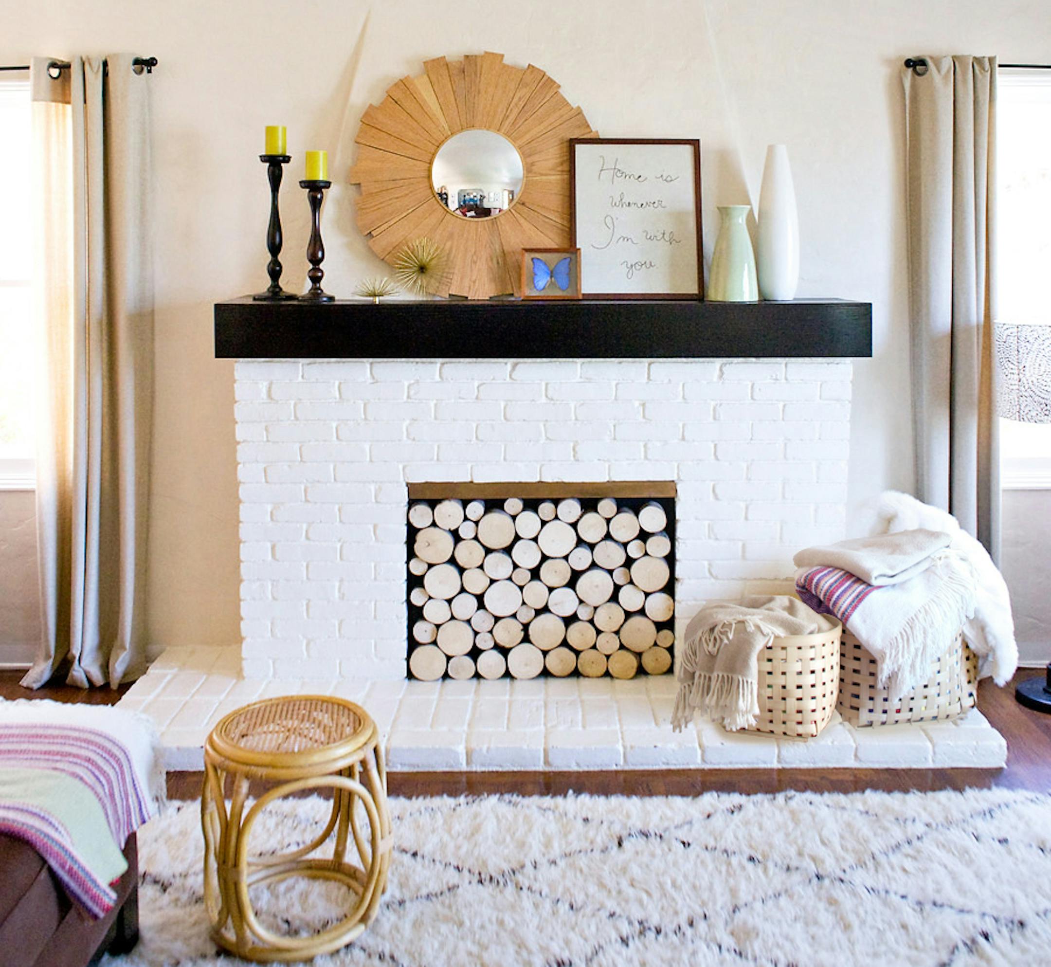 Morgan Spenla wanted the look of a log stack inside her nonworking fireplace — without the bugs. She instead created a facade that is easily removable. MUST CREDIT: Morgan Spenla