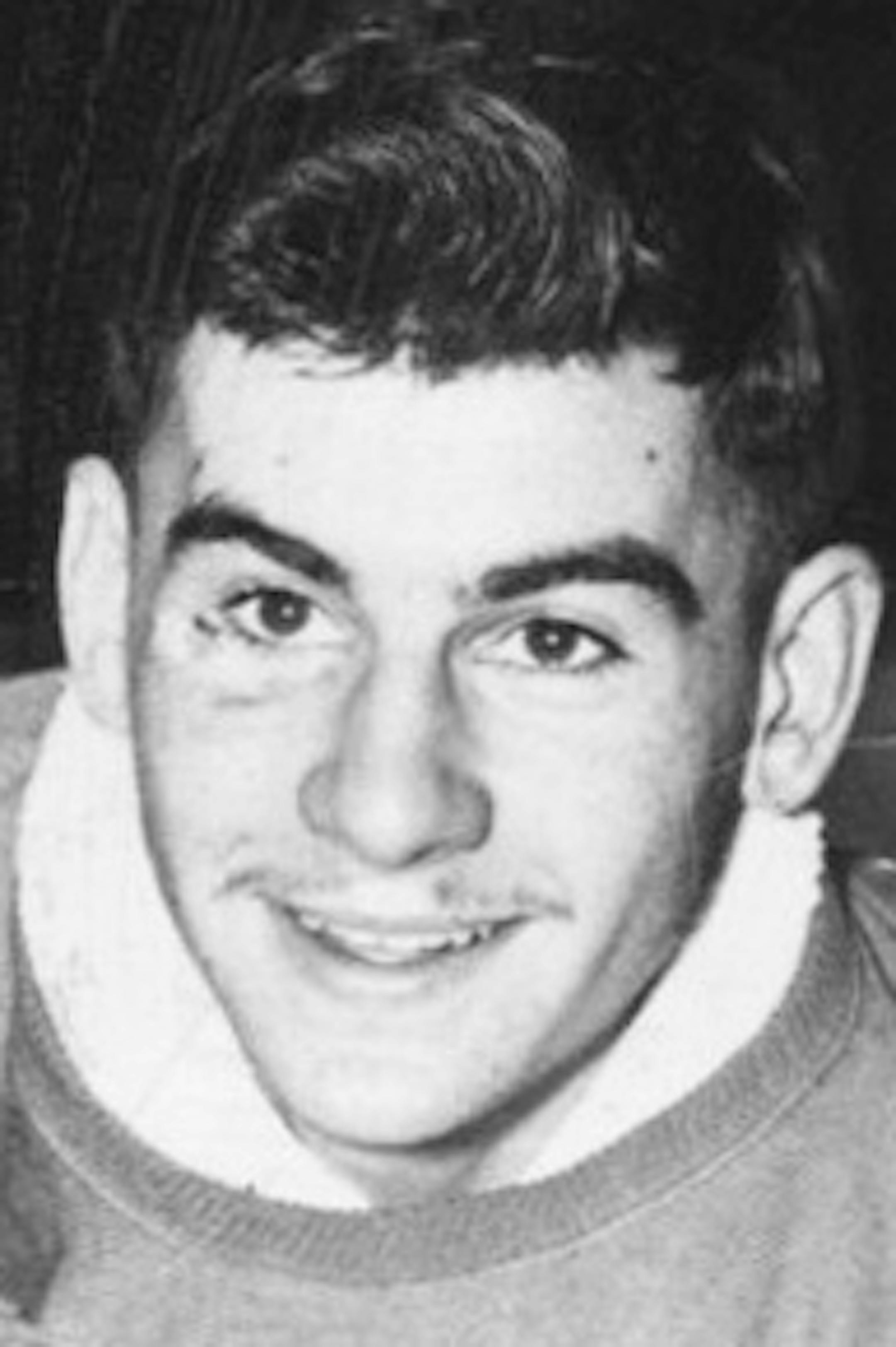 Eveleth High School hockey player John Matchefts, 1949 handout photo.