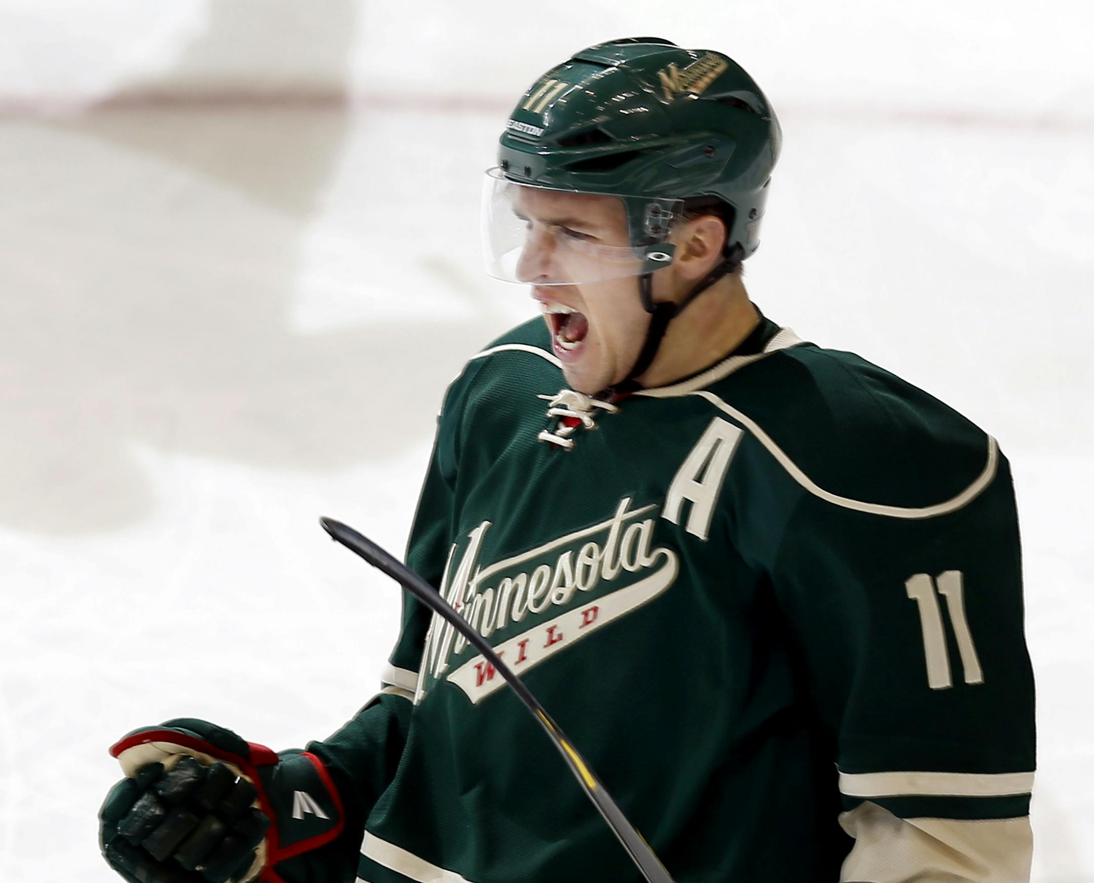Zach Parise (11) celebrated after scoring a goal in the second period. Minnesota beat San Jose by final score of 2-0. ] CARLOS GONZALEZ cgonzalez@startribune.com - March 23, 2013, St. Paul, Minn., Xcel Energy Center, NHL, Minnesota Wild vs. San Jose Sharks