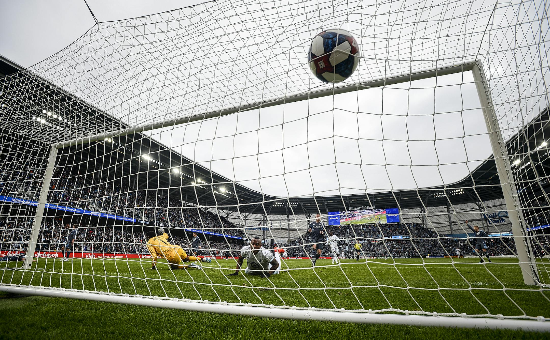 Minnesota United's Angelo Rodriguez (9) scores against NYC FC goalkeeper Sean Johnson (1) off a diving header in the first half on Saturday, April 13, 2019, at Allianz Field in St. Paul, Minn. The game ended in a 3-3 draw. (Aaron Lavinsky/Minneapolis Star Tribune/TNS)