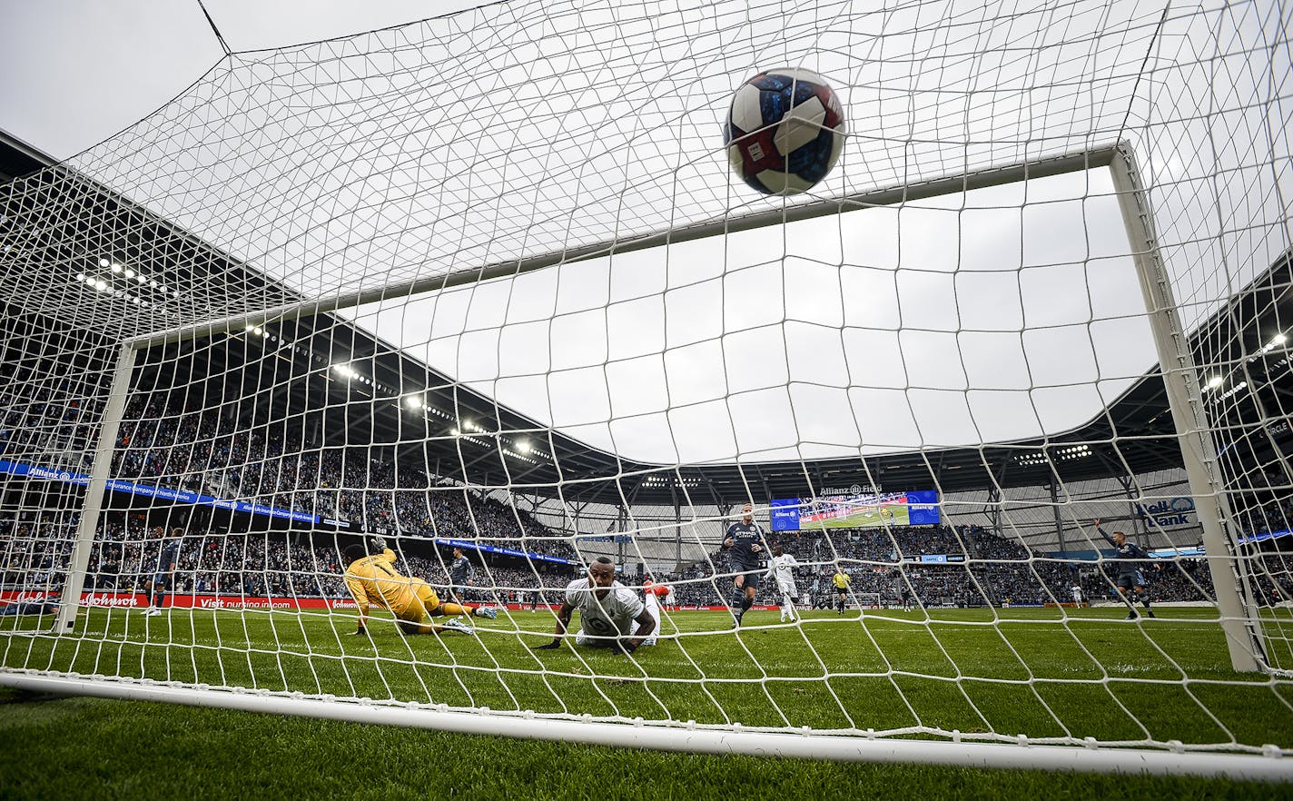 Minnesota United's Angelo Rodriguez (9) scores against NYC FC goalkeeper Sean Johnson (1) off a diving header in the first half on Saturday, April 13, 2019, at Allianz Field in St. Paul, Minn. The game ended in a 3-3 draw. (Aaron Lavinsky/Minneapolis Star Tribune/TNS)