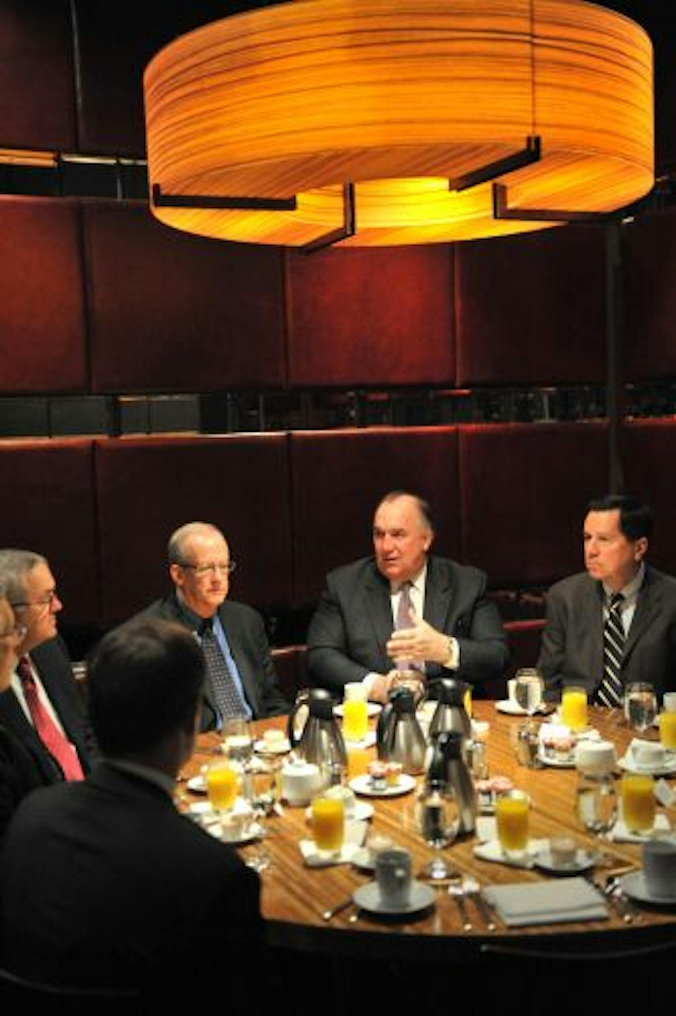 John Engler, president and CEO of the National Association of Manufacturers met over breakfast with several Minnesota companies at Graves 601 Hotel Wednesday morning to discuss the NAM agenda in Washington, D.C. Clockwise from left are Chip Tangen, regional manager NAM, Steven Tourek, senior VP and general counsel, The Marvin Companies, Russell Huffer, chairman and CEO Apogee Enterprises Inc., Thomas Murphy, executive VP RSM McGladrey, Inc., Engler, and John Woodworth, senior VP 3M Company.